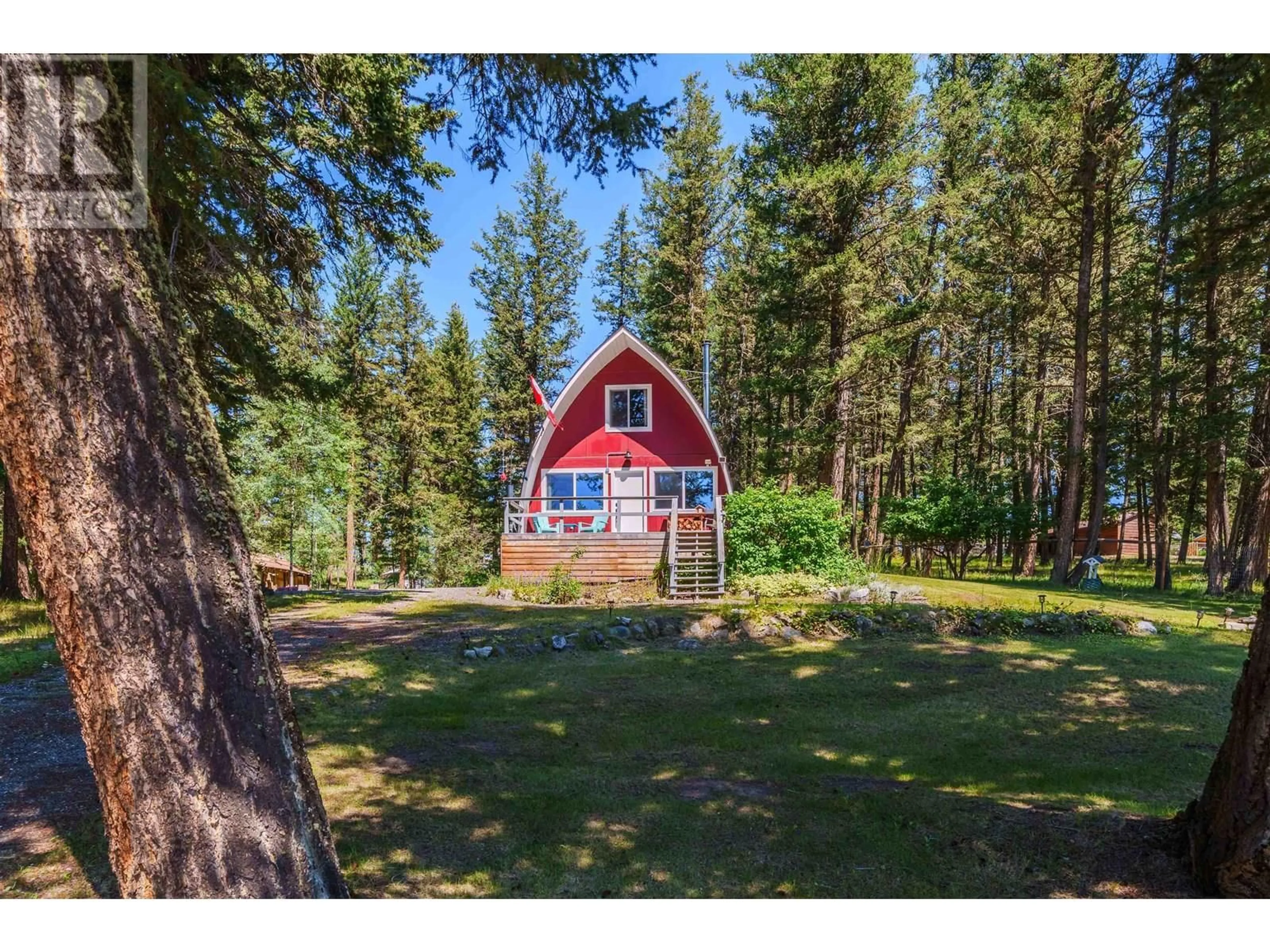 A pic from outside/outdoor area/front of a property/back of a property/a pic from drone, forest/trees view for 5176 KALLUM DRIVE, 108 Mile Ranch British Columbia V0K2Z0