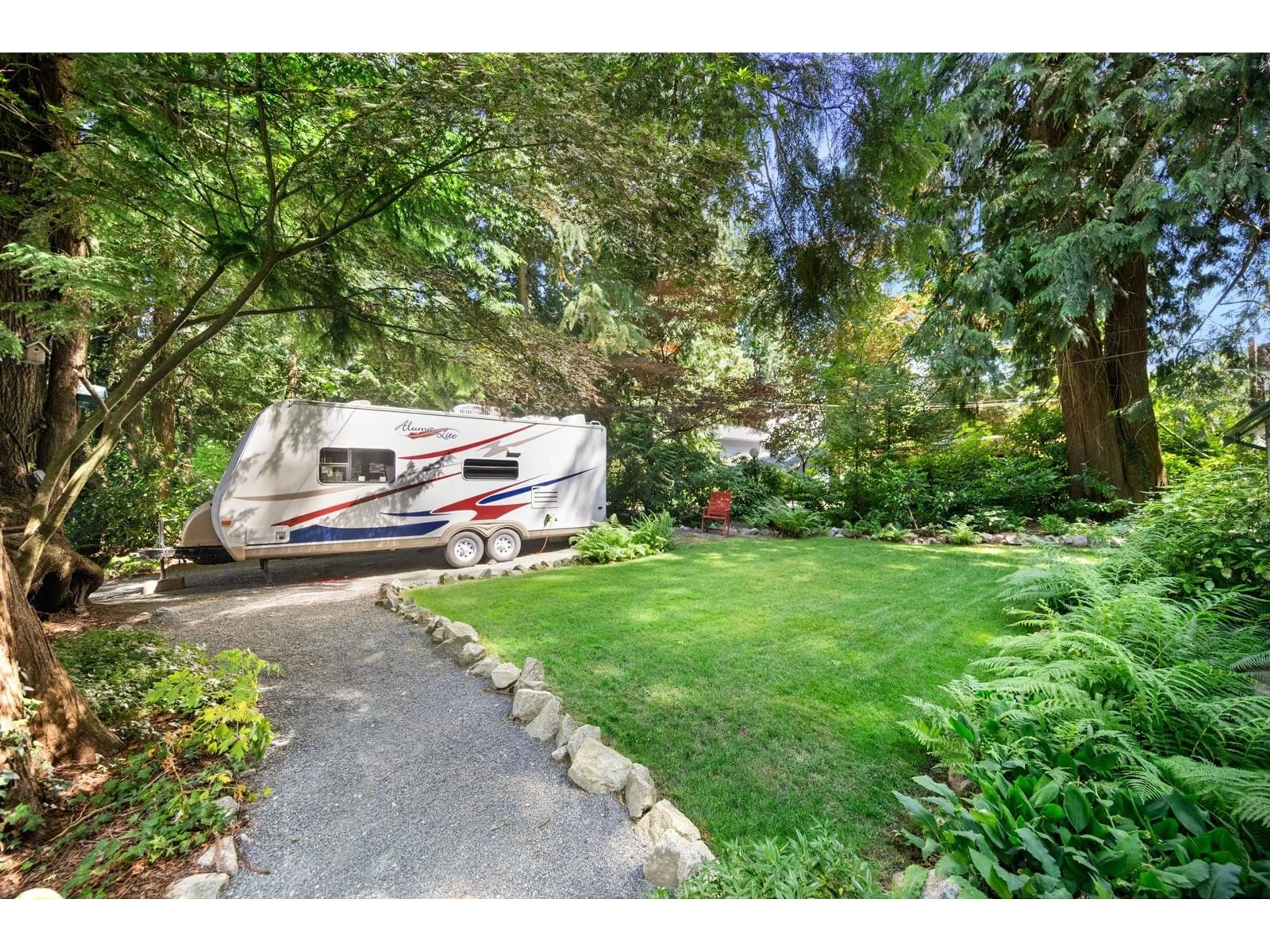 A pic from outside/outdoor area/front of a property/back of a property/a pic from drone, unknown for 4961 202A, Langley British Columbia V3A1T6