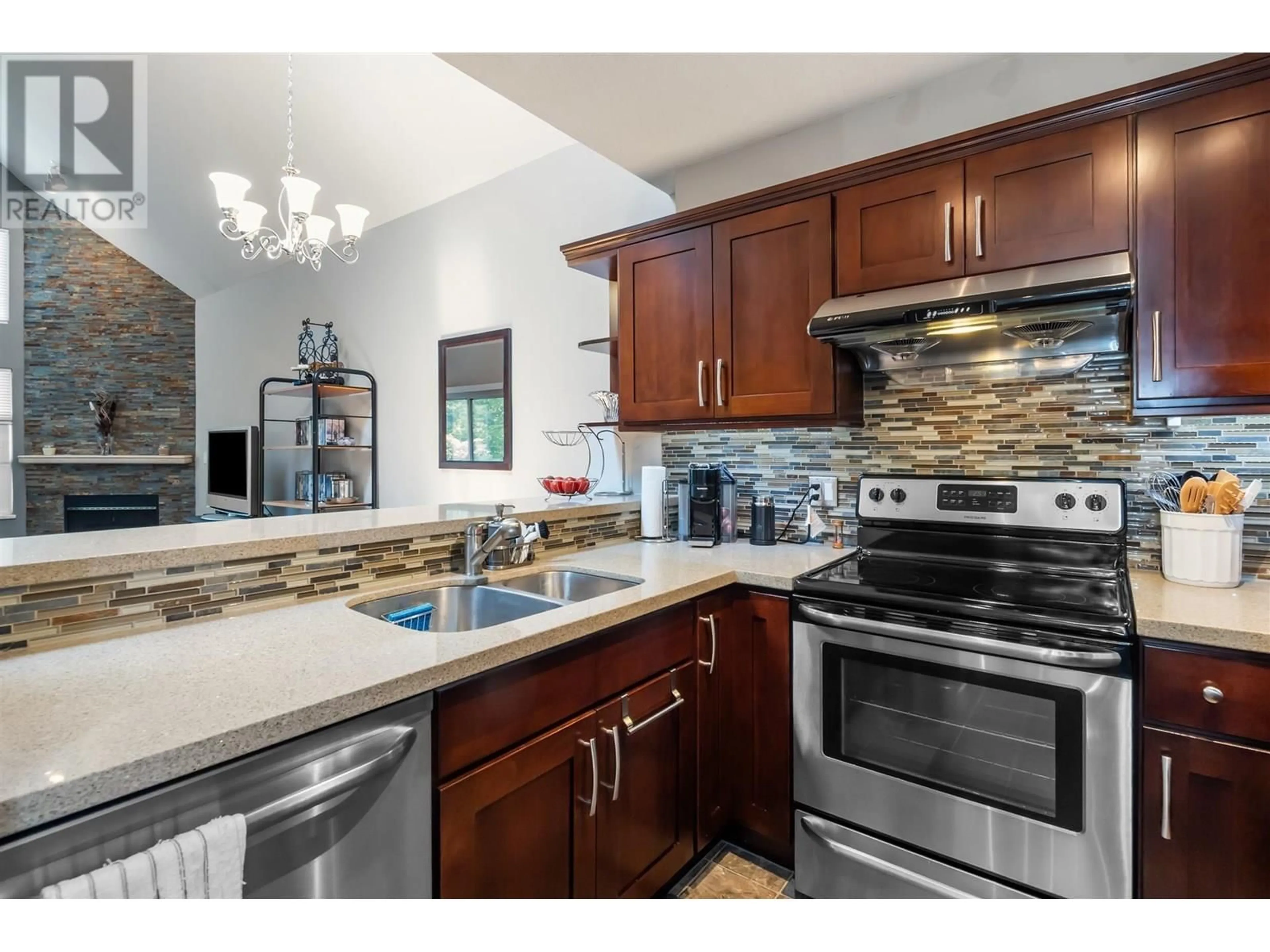 Open concept kitchen, ceramic/tile floor for 307 - 7465 SANDBORNE AVENUE, Burnaby British Columbia V3N4W7