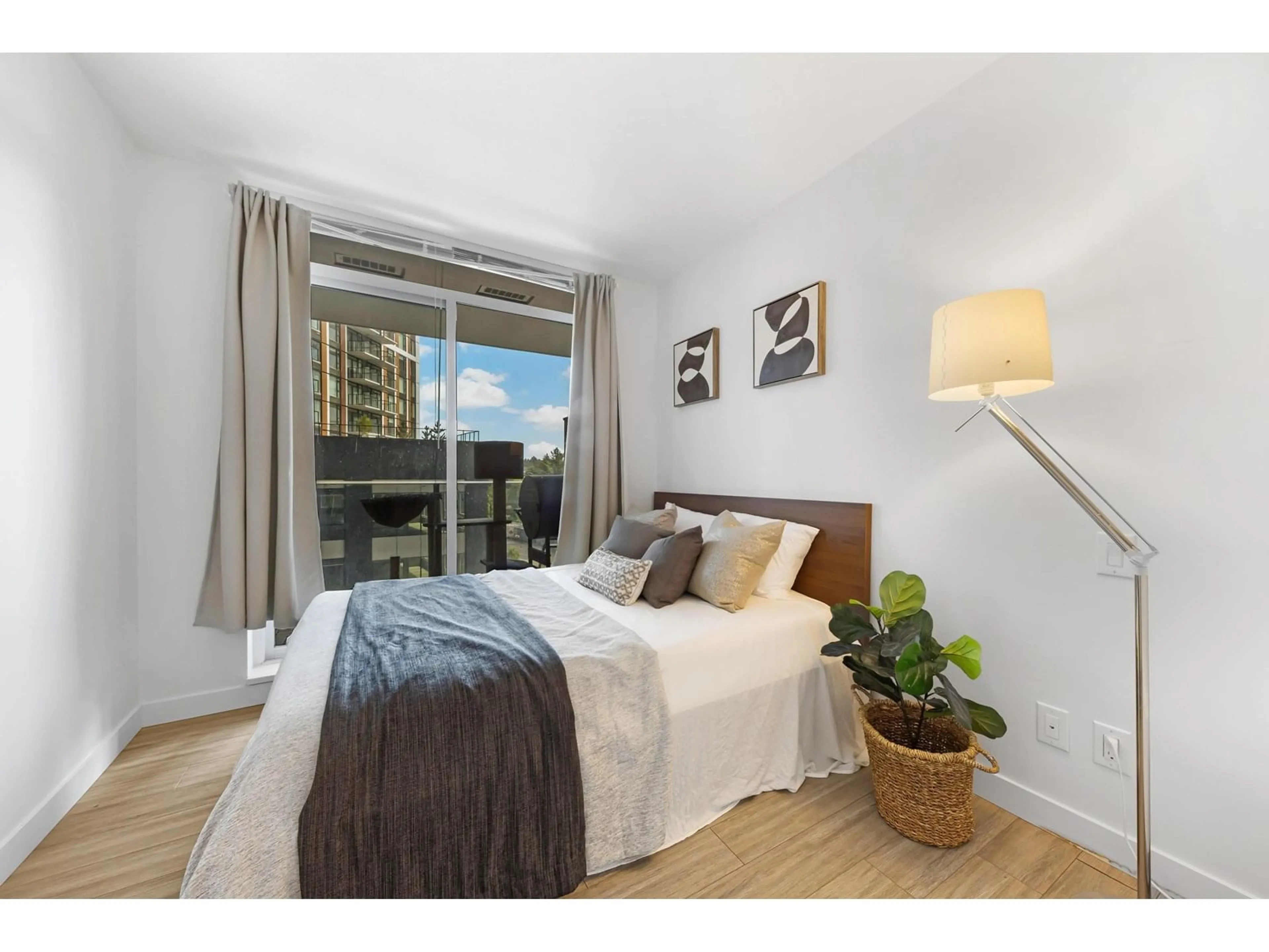 Bedroom with bed, wood/laminate floor for 509 - 13655 FRASER, Surrey British Columbia V3T0P8