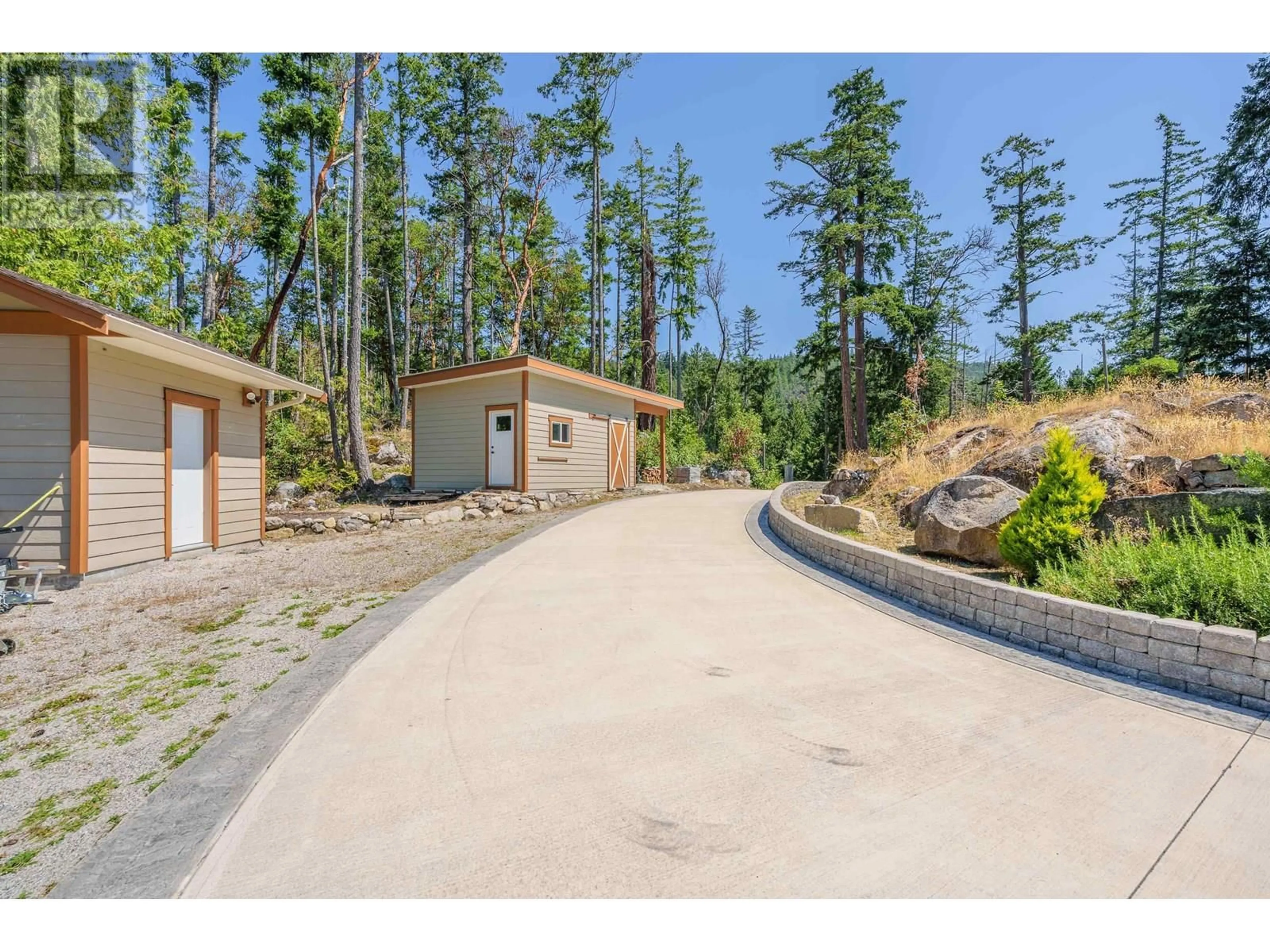 A pic from outside/outdoor area/front of a property/back of a property/a pic from drone, unknown for 10825 WOOD BAY RIDGE ROAD, Halfmoon Bay British Columbia V7Z1B8