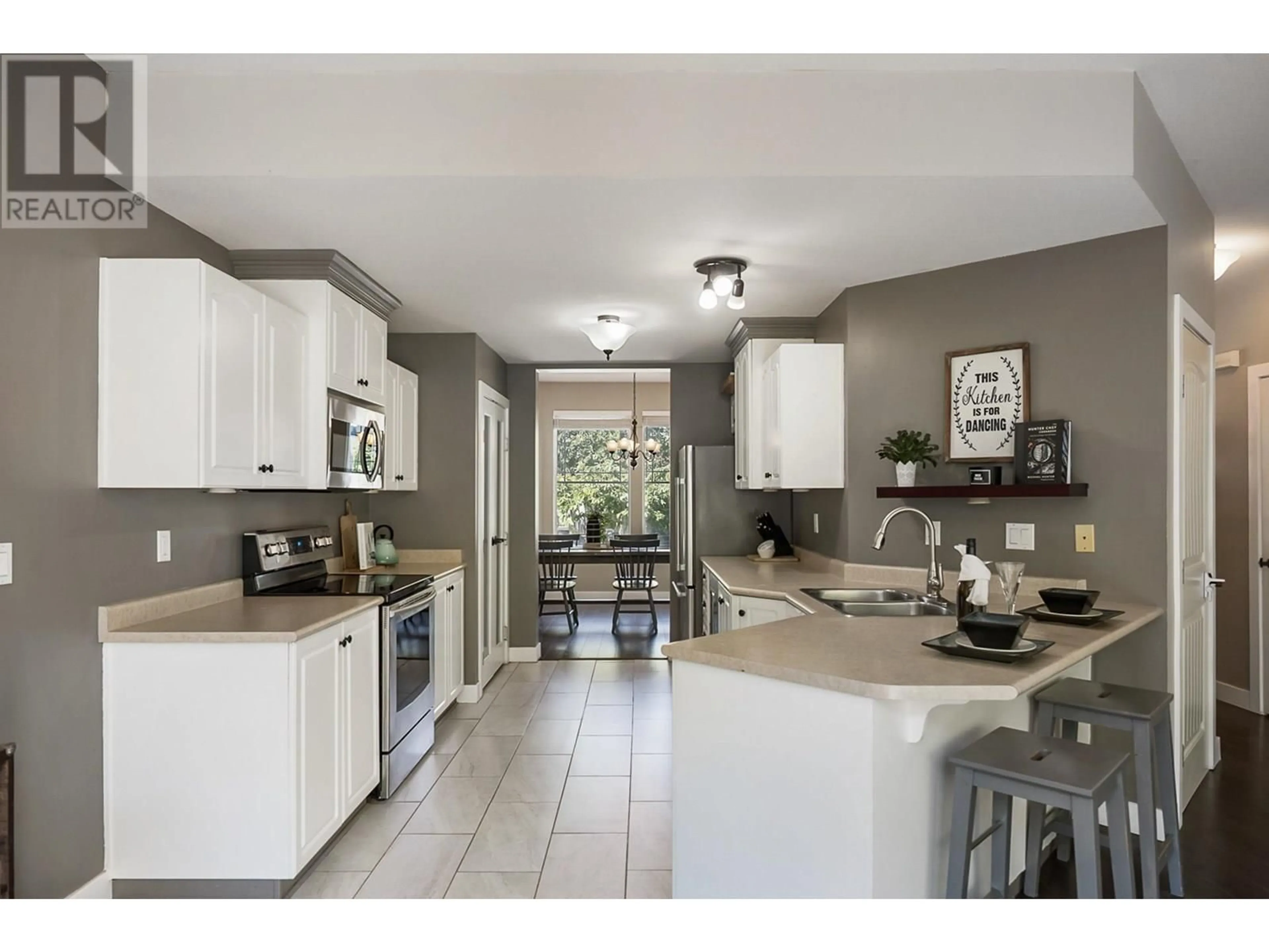 Open concept kitchen, ceramic/tile floor for 24372 101A AVENUE, Maple Ridge British Columbia V2W1W6