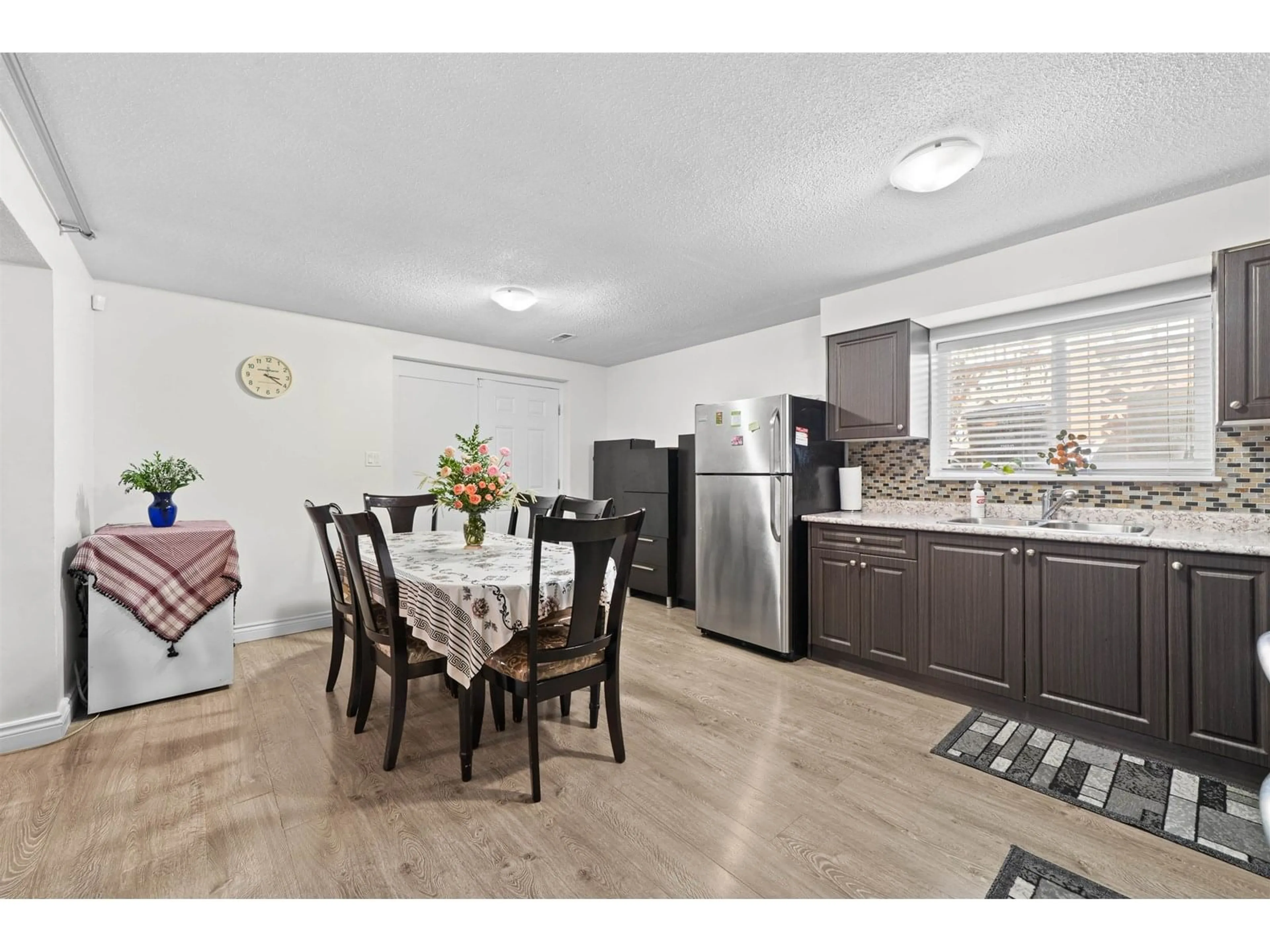 Open concept kitchen, wood/laminate floor for 13687 112, Surrey British Columbia V3R2G4