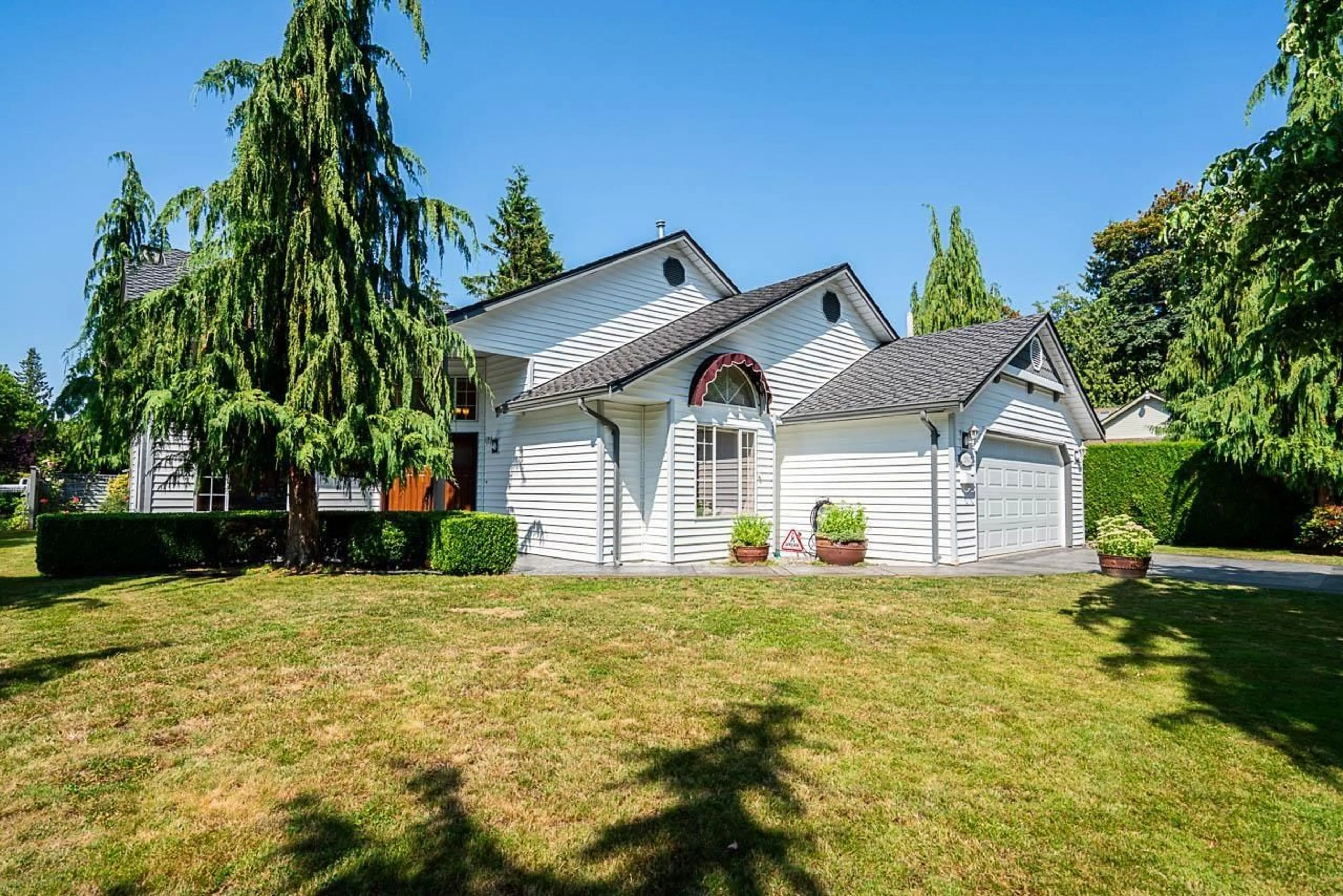 Home with vinyl exterior material, street for 20561 93A, Langley British Columbia V1M1Z1