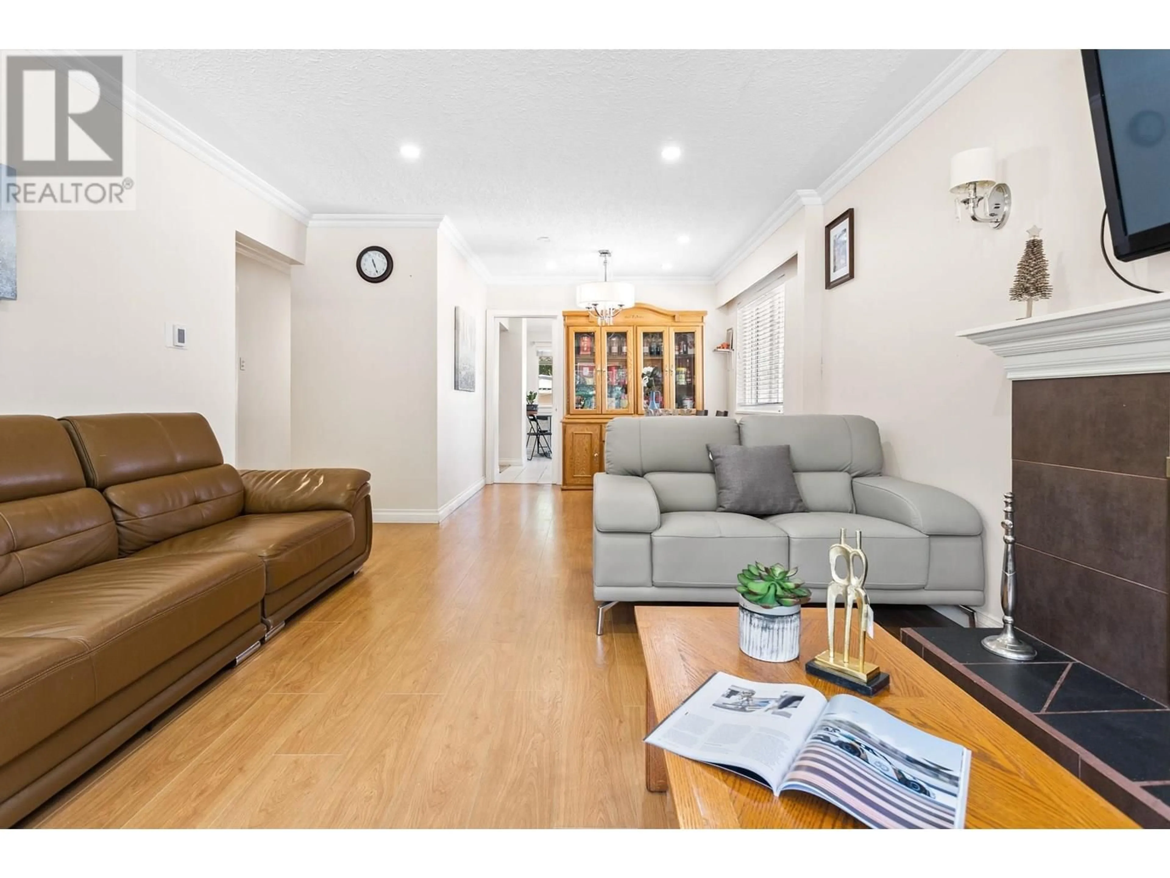 Living room with furniture, wood/laminate floor for 3410 EUCLID AVENUE, Vancouver British Columbia V5R5G4