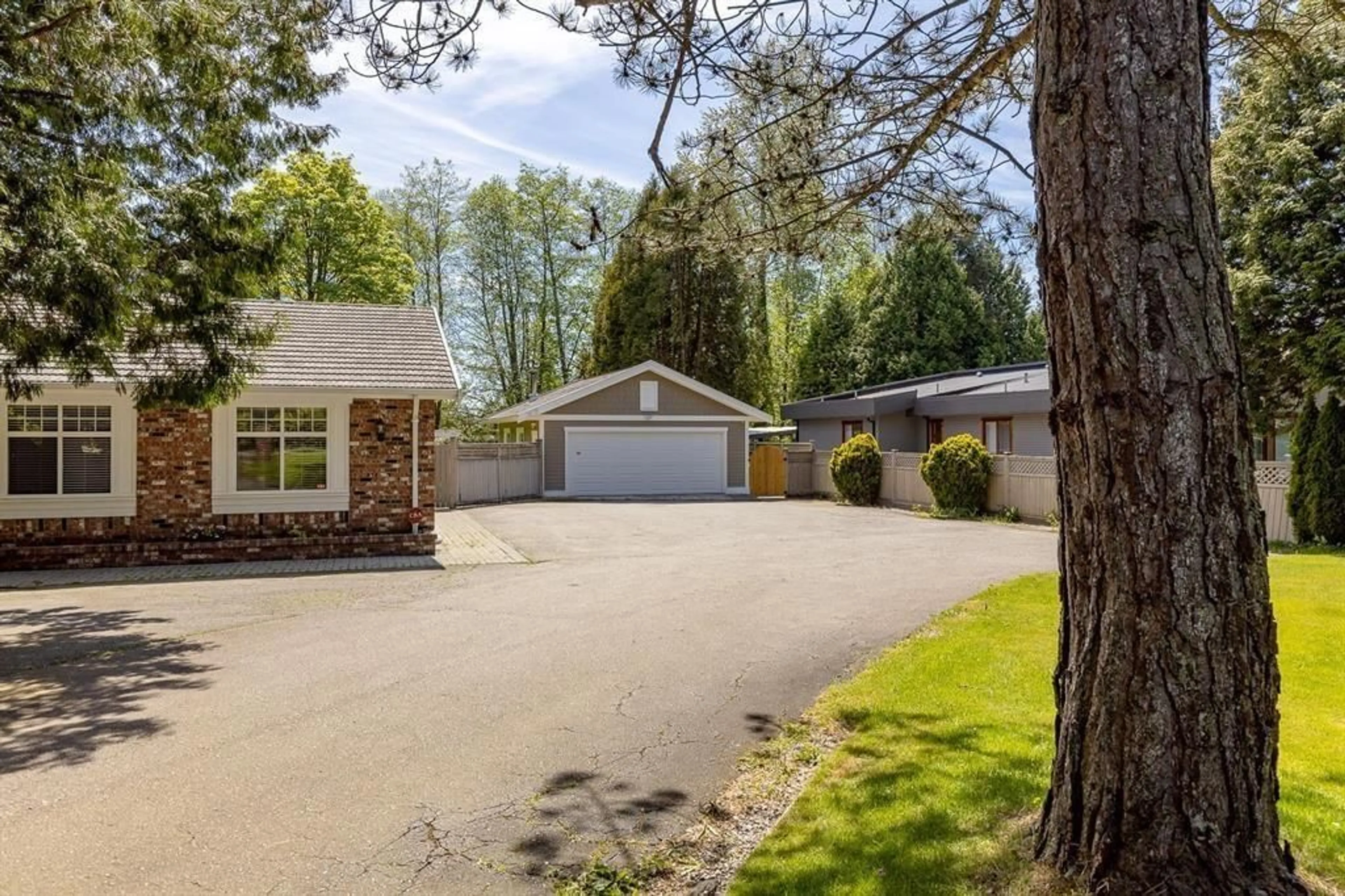A pic from outside/outdoor area/front of a property/back of a property/a pic from drone, street for 17078 21, Surrey British Columbia V3Z9Z4