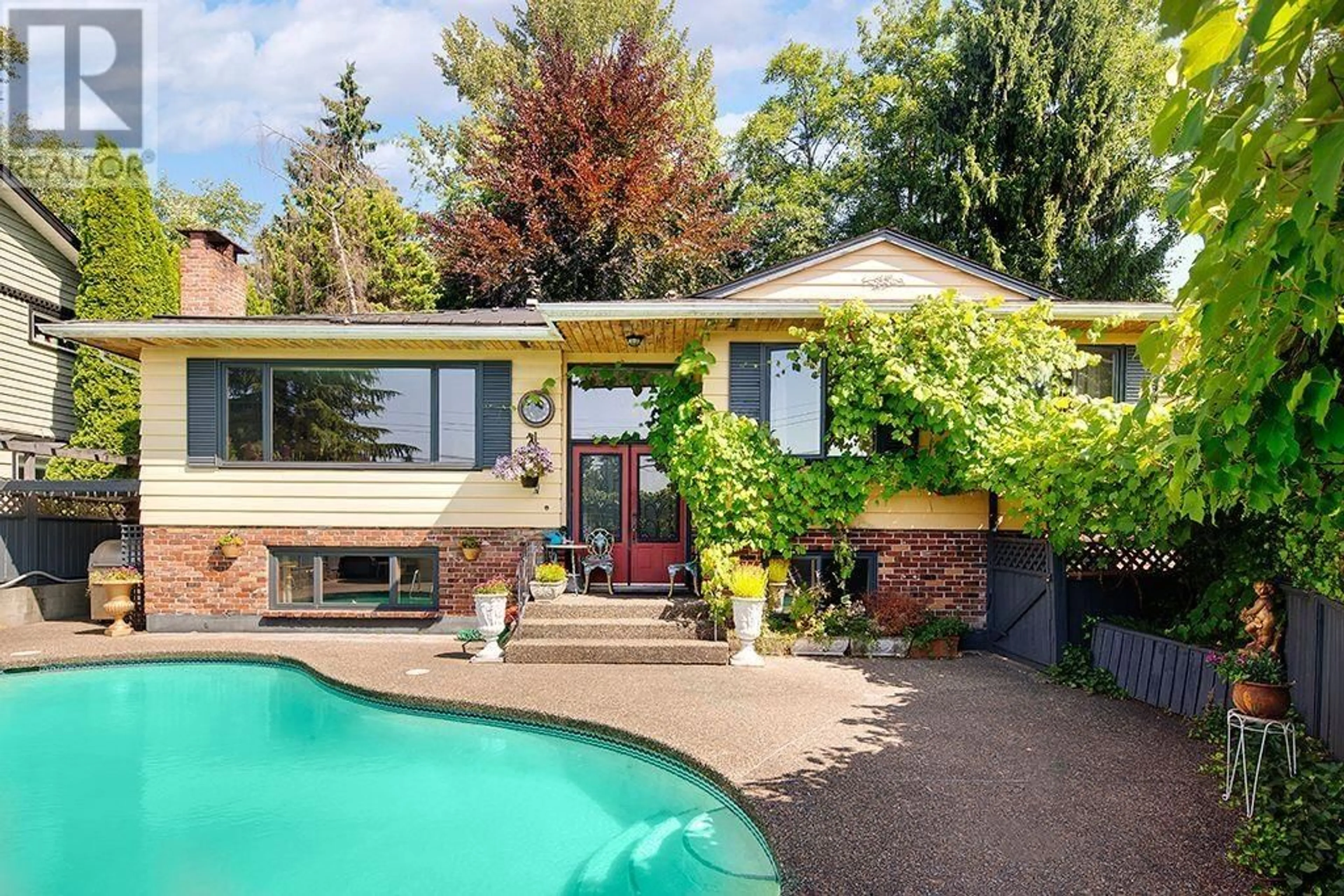 Home with brick exterior material, street for 1240 EASTVIEW ROAD, North Vancouver British Columbia V7J1L6