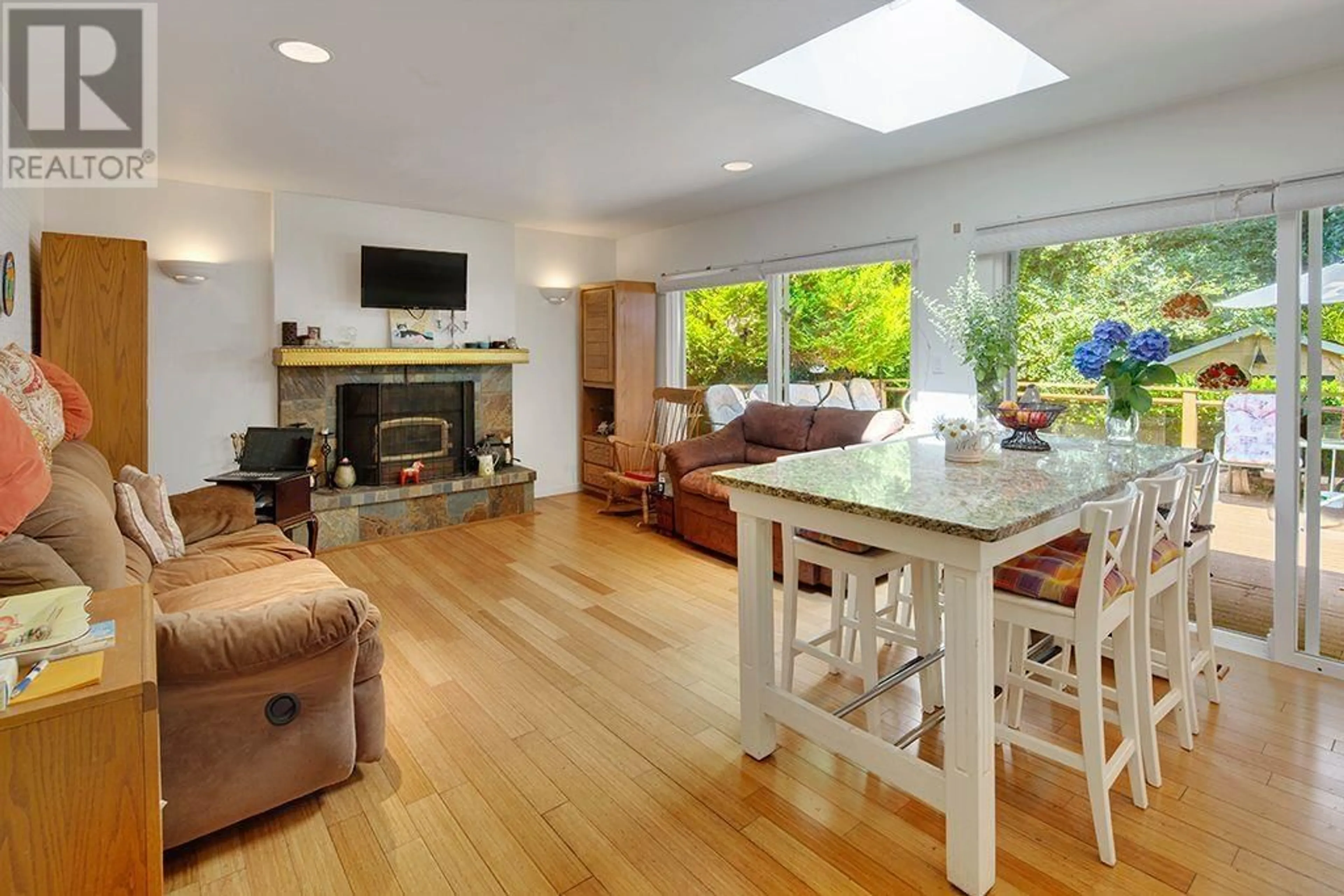 Living room with furniture, wood/laminate floor for 1240 EASTVIEW ROAD, North Vancouver British Columbia V7J1L6