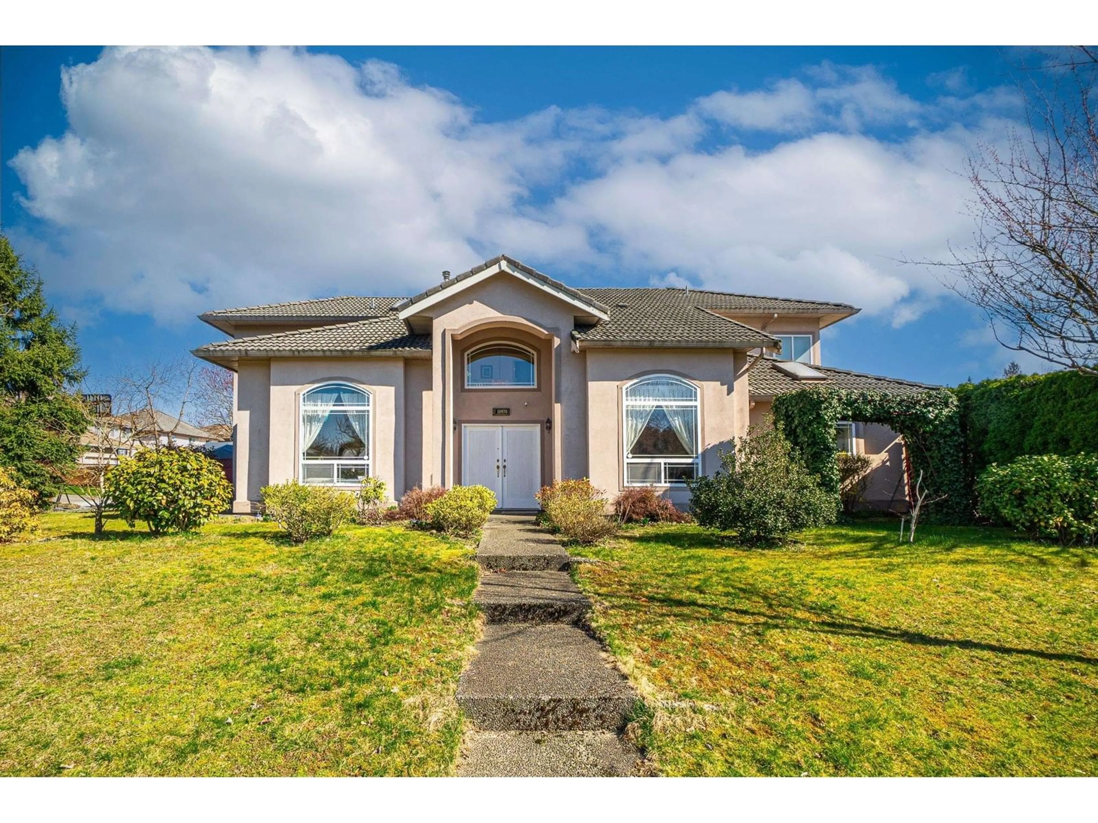 Home with vinyl exterior material, street for 10970 155, Surrey British Columbia V3R0X6