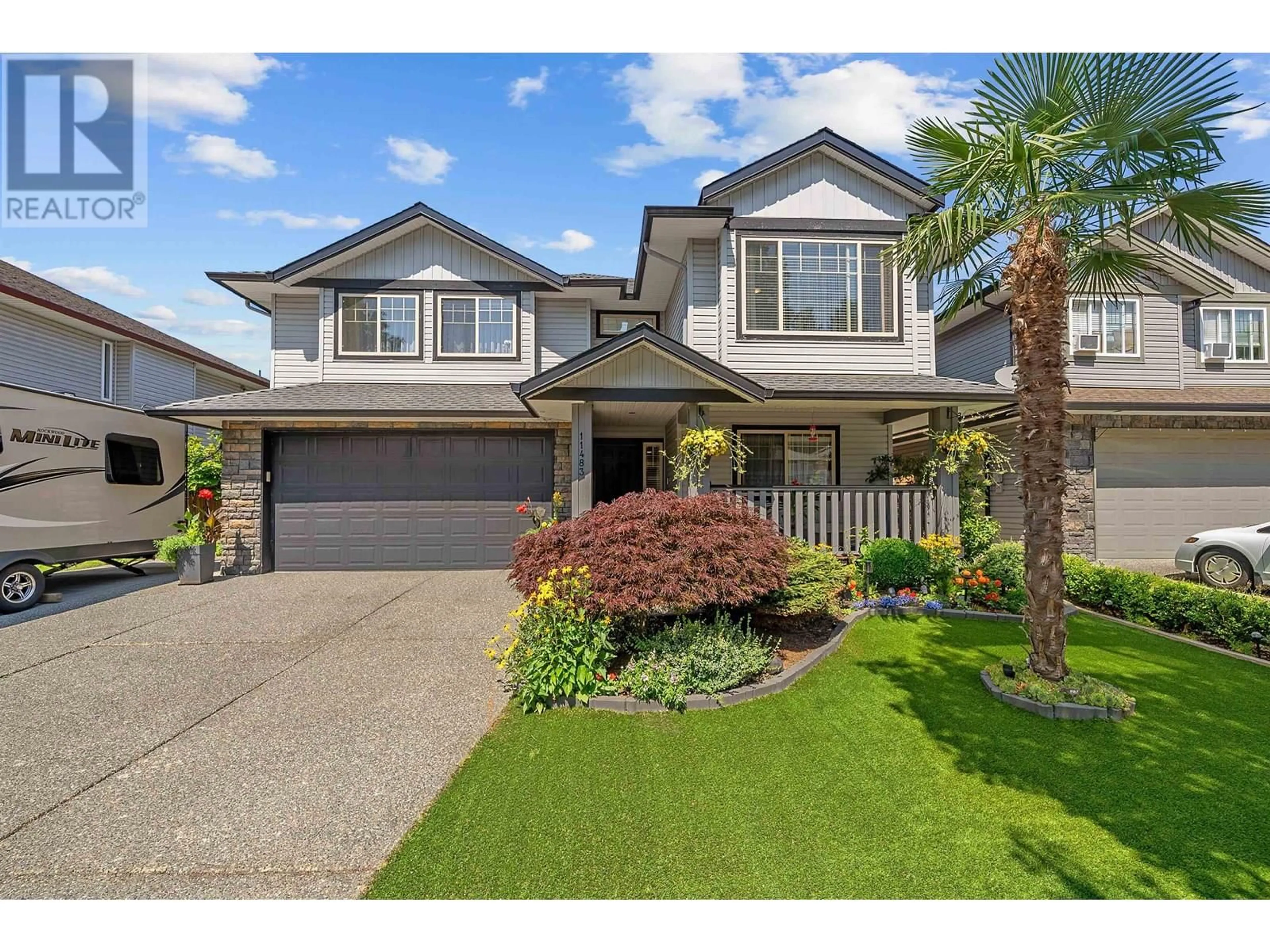 Home with vinyl exterior material, street for 11483 CREEKSIDE STREET, Maple Ridge British Columbia V2W2C1