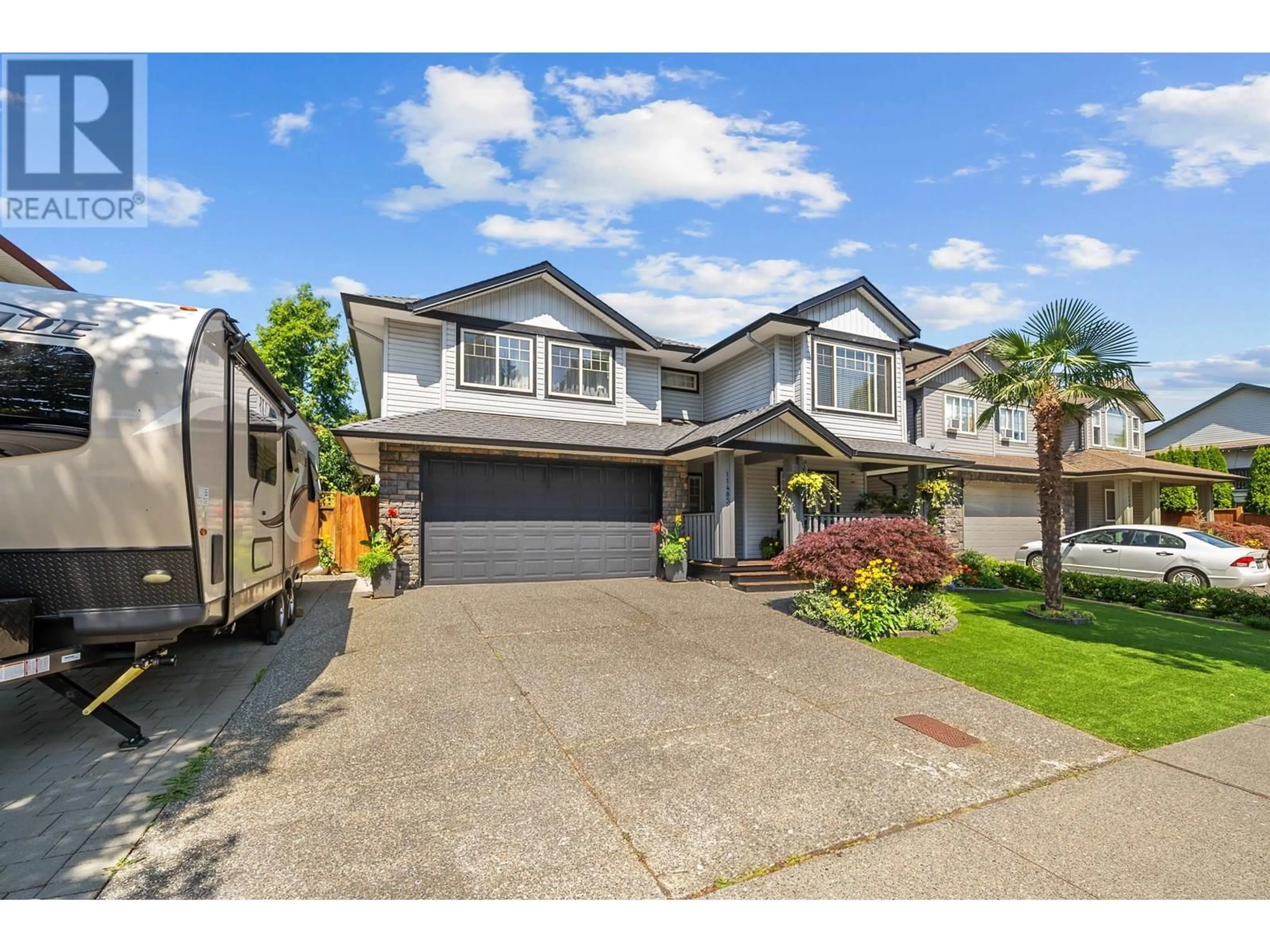 Home with vinyl exterior material, street for 11483 CREEKSIDE STREET, Maple Ridge British Columbia V2W2C1