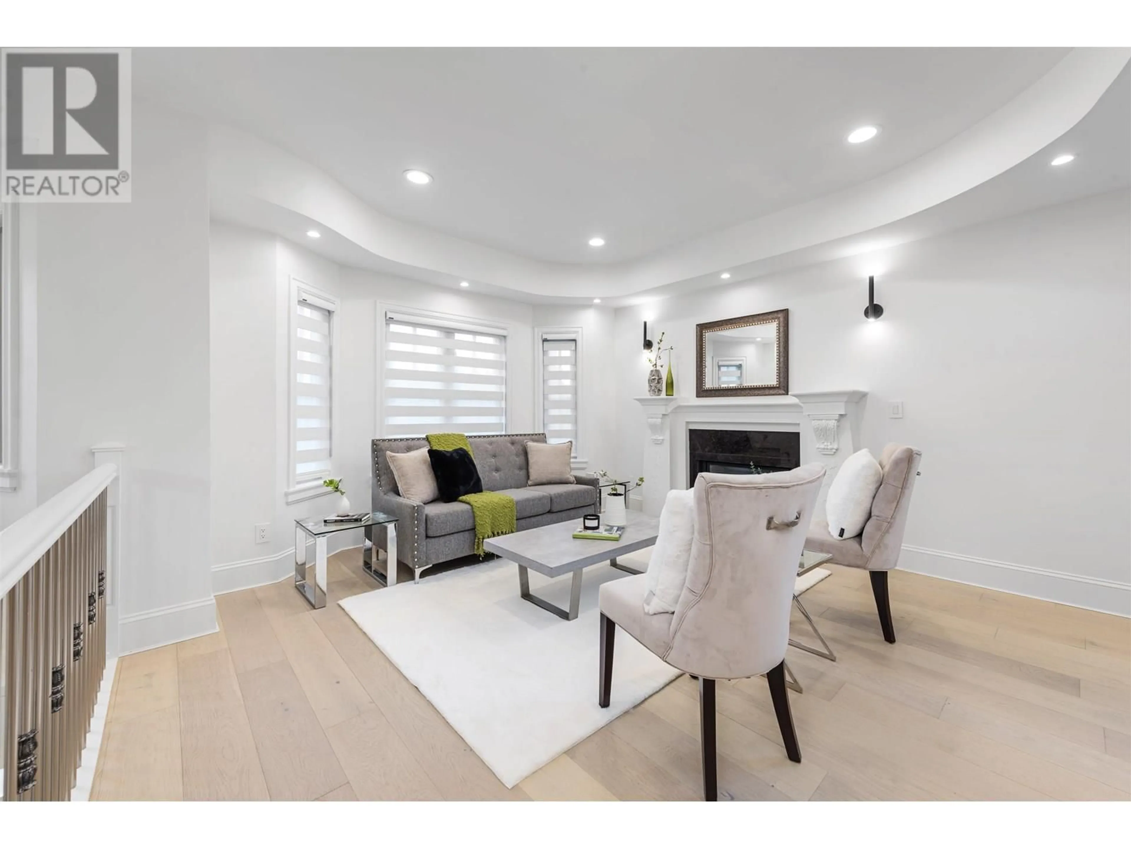 Living room with furniture, wood/laminate floor for 7778 NURSERY STREET, Burnaby British Columbia V5E2B4
