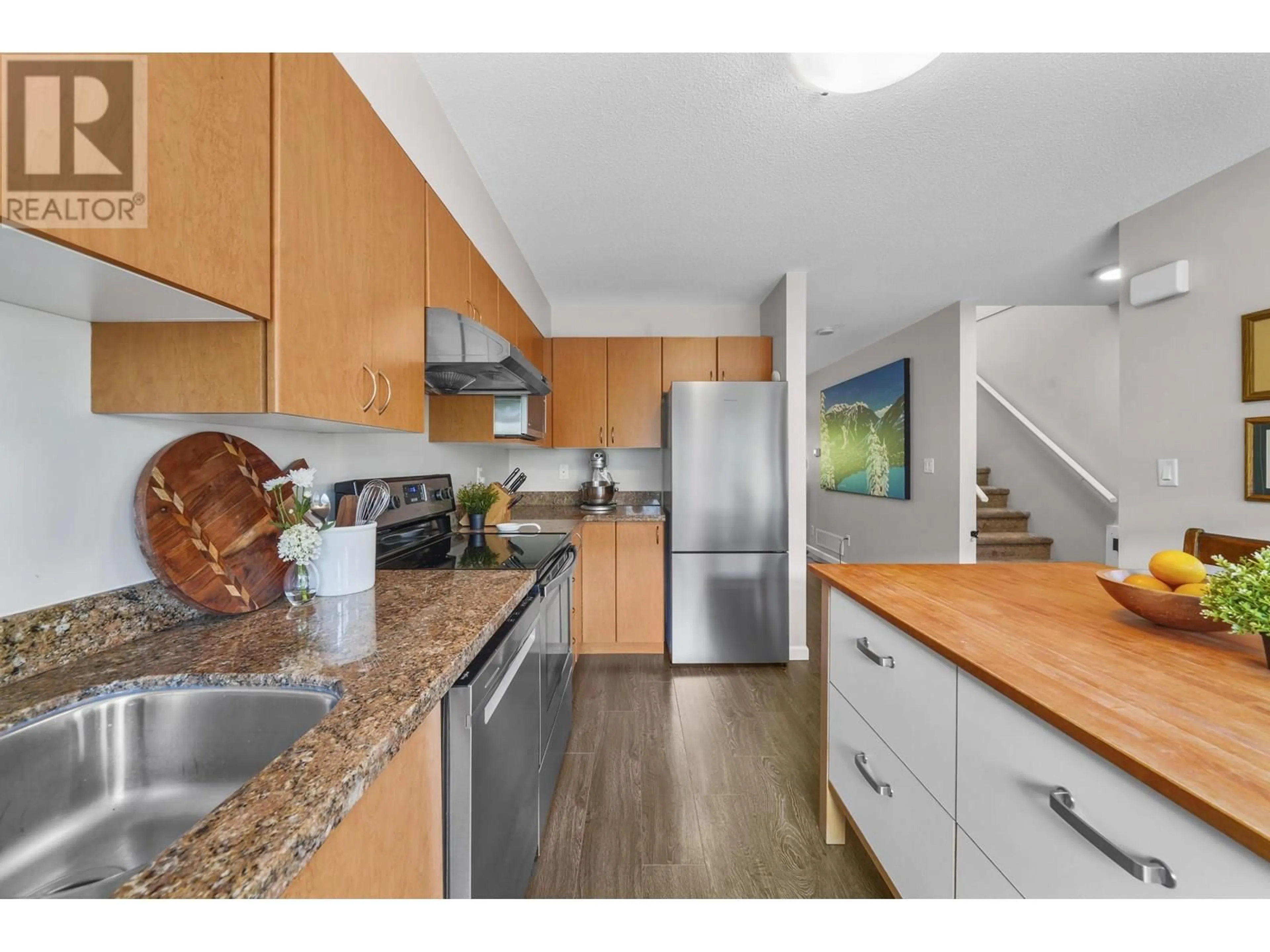 Open concept kitchen, wood/laminate floor for 7 - 1268 RIVERSIDE DRIVE, Port Coquitlam British Columbia V3B0A8
