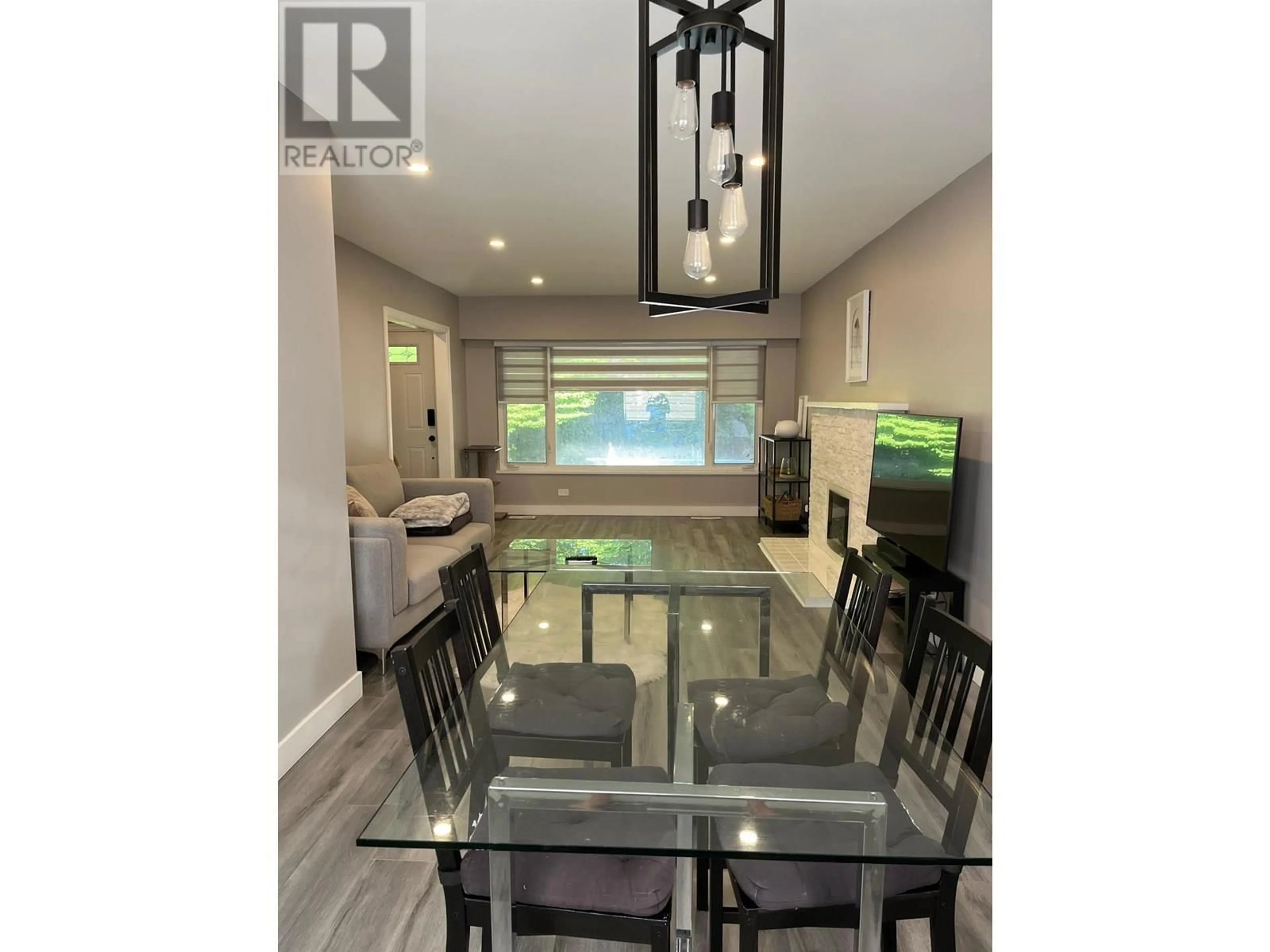 Open concept kitchen, wood/laminate floor for 4749 FAIRMONT STREET, Vancouver British Columbia V5R3V1