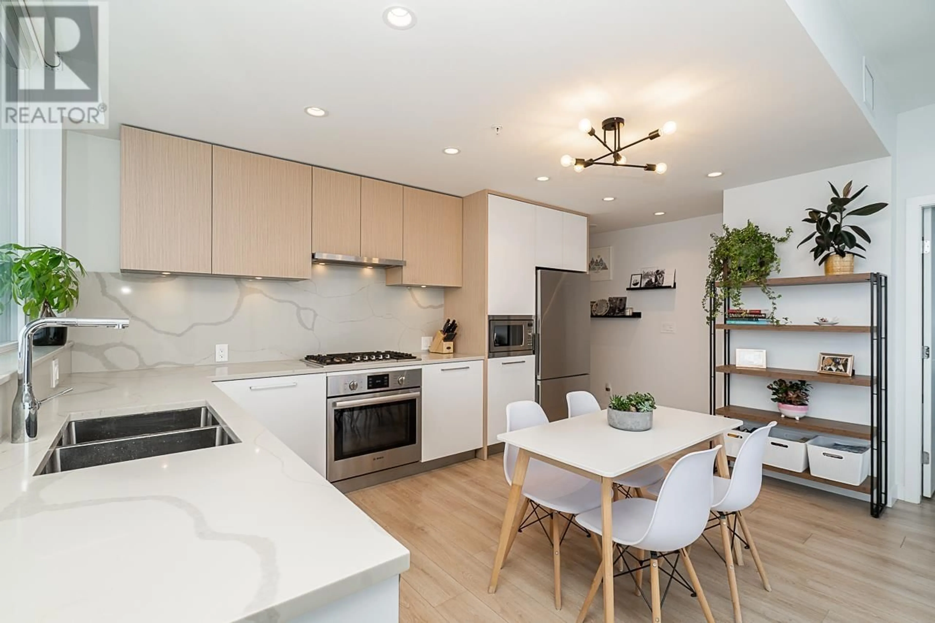 Open concept kitchen, unknown for 2704 - 567 CLARKE ROAD, Coquitlam British Columbia V3J0K7