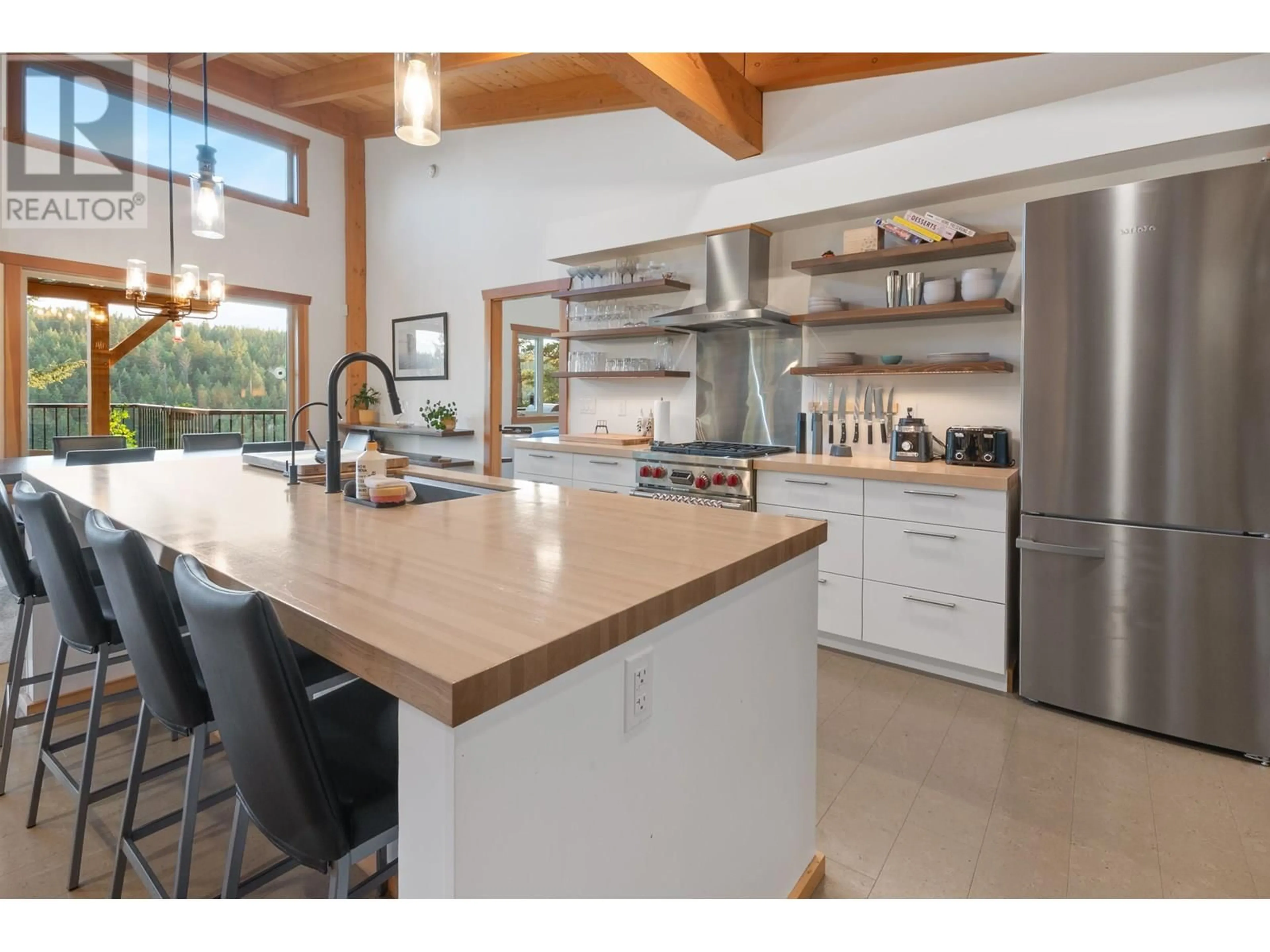 Open concept kitchen, unknown for 4906 GLOINNZUN CRESCENT, 108 Mile Ranch British Columbia V0K2Z0