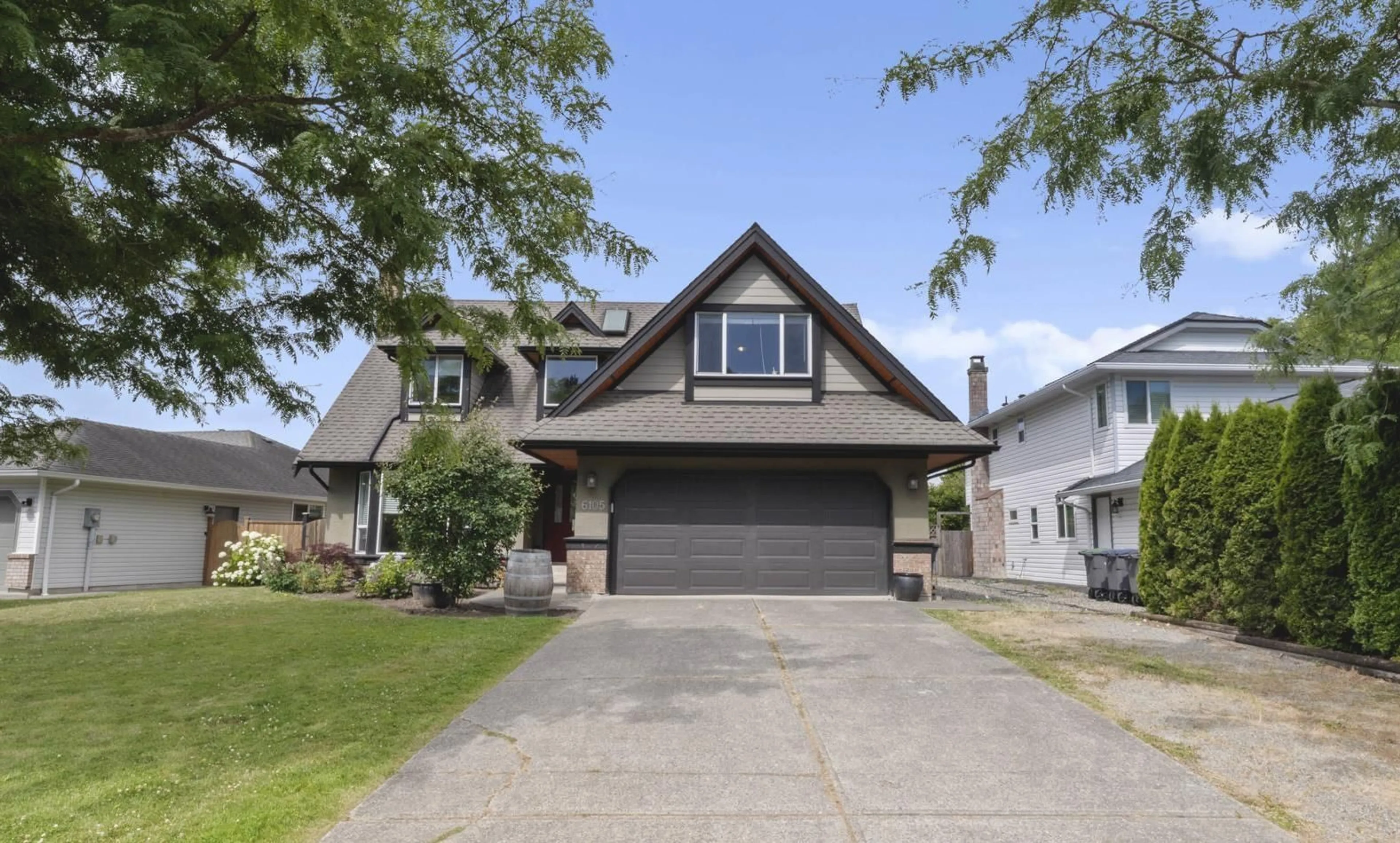 Home with vinyl exterior material, street for 6105 187A, Surrey British Columbia V3S7R6