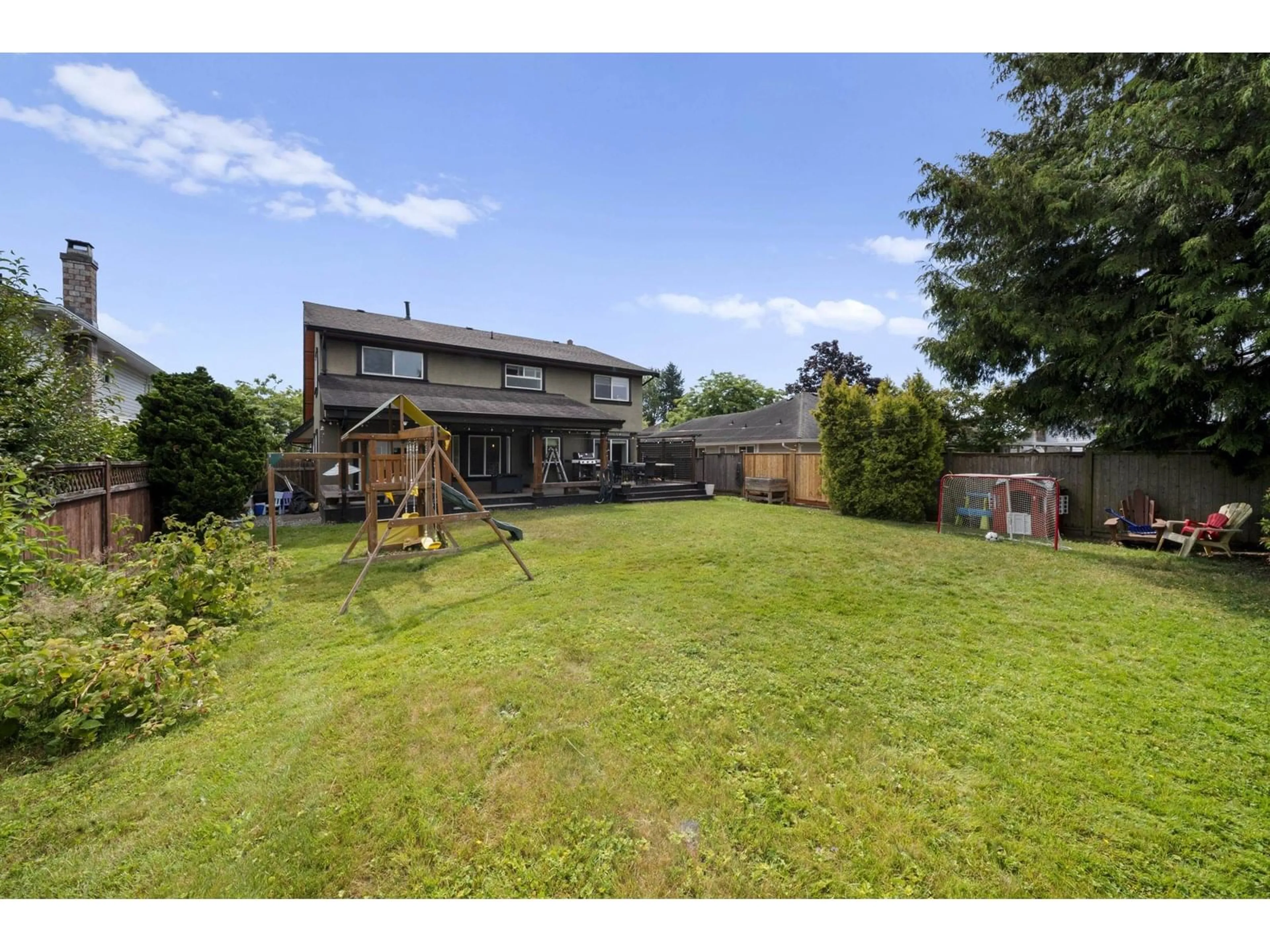 A pic from outside/outdoor area/front of a property/back of a property/a pic from drone, unknown for 6105 187A, Surrey British Columbia V3S7R6