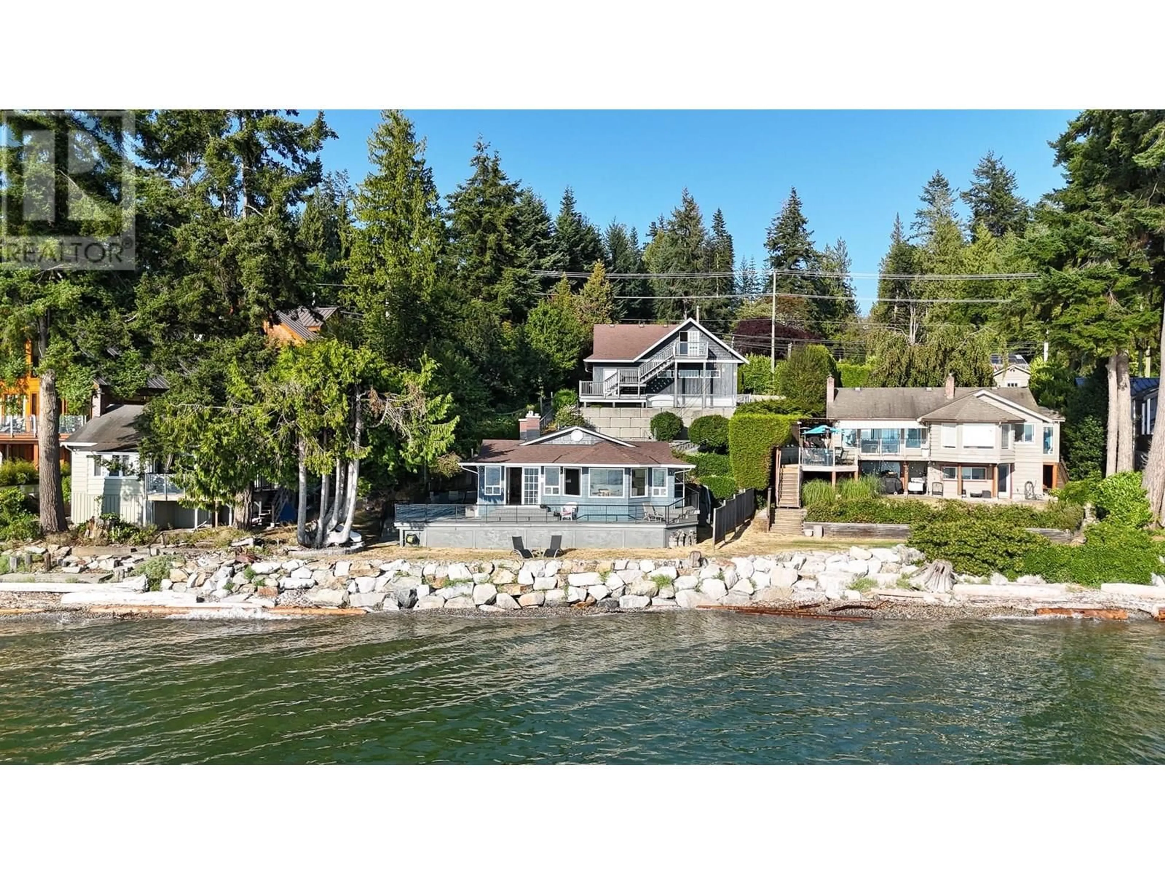 A pic from outside/outdoor area/front of a property/back of a property/a pic from drone, water/lake/river/ocean view for 4857 SUNSHINE COAST HIGHWAY, Sechelt British Columbia V7Z0B6