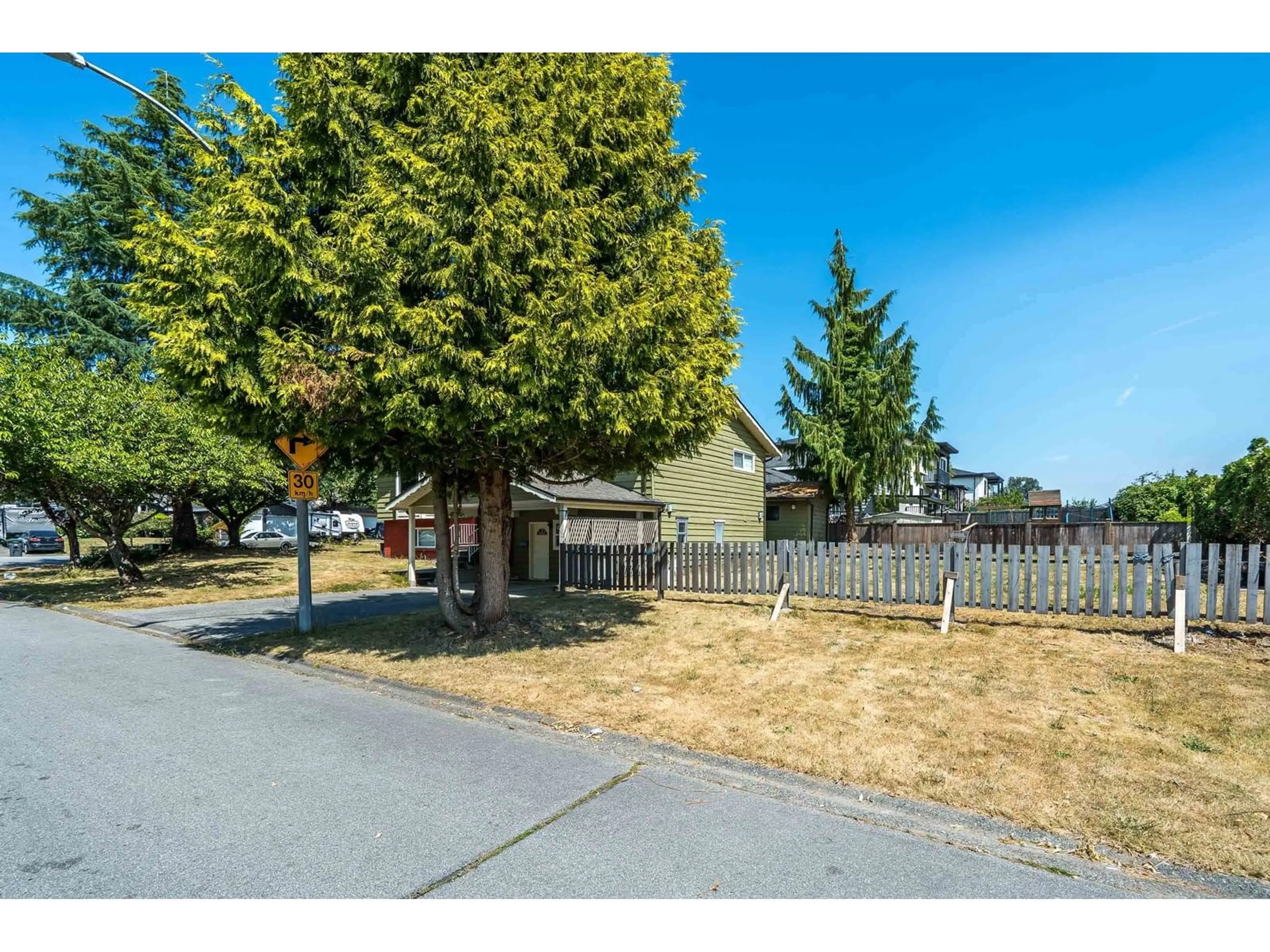 A pic from outside/outdoor area/front of a property/back of a property/a pic from drone, street for 14458 CHARTWELL, Surrey British Columbia V3S5E4