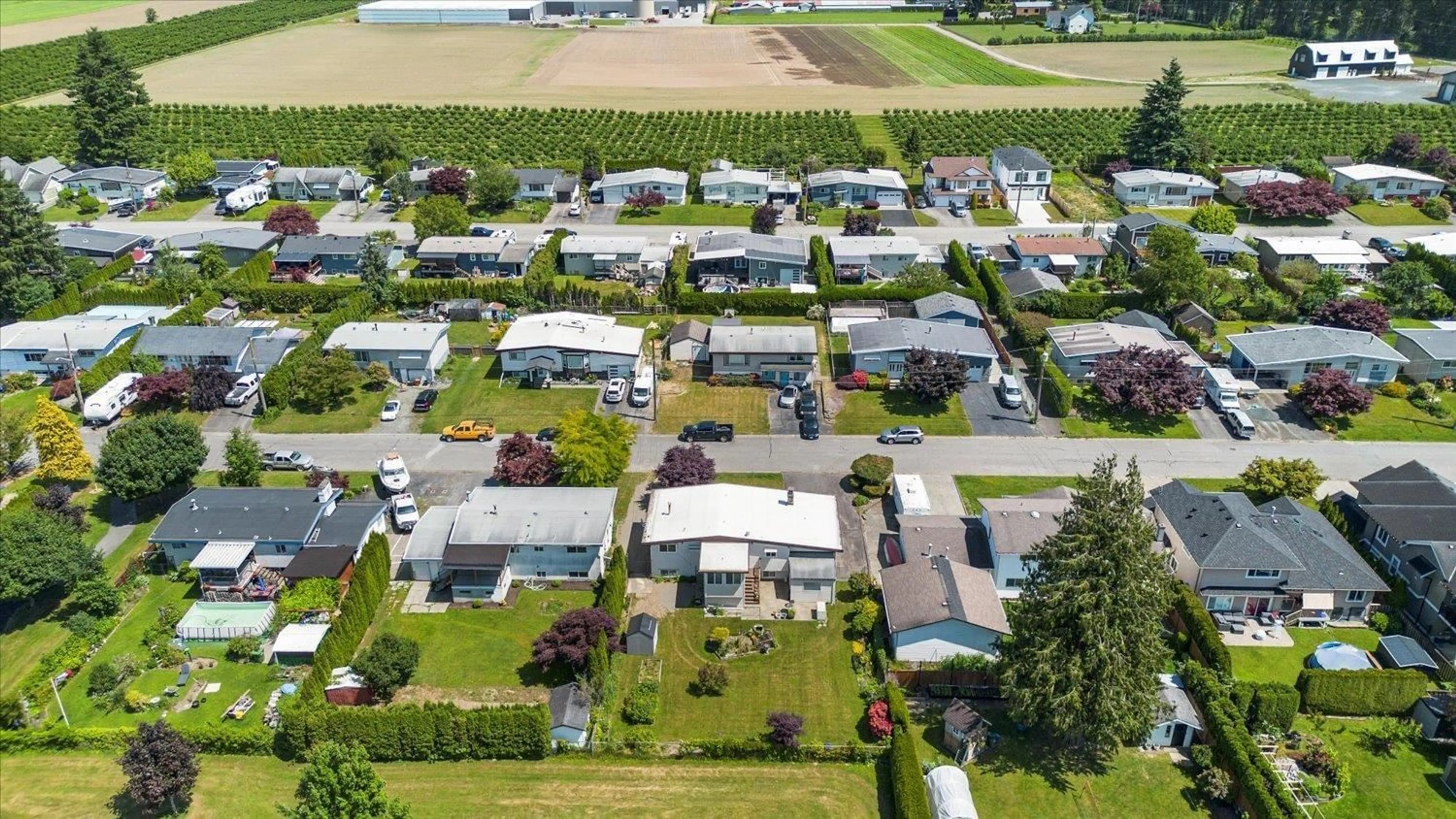 A pic from outside/outdoor area/front of a property/back of a property/a pic from drone, street for 10287 BEVERLEY DRIVE, Chilliwack British Columbia V2P6B2