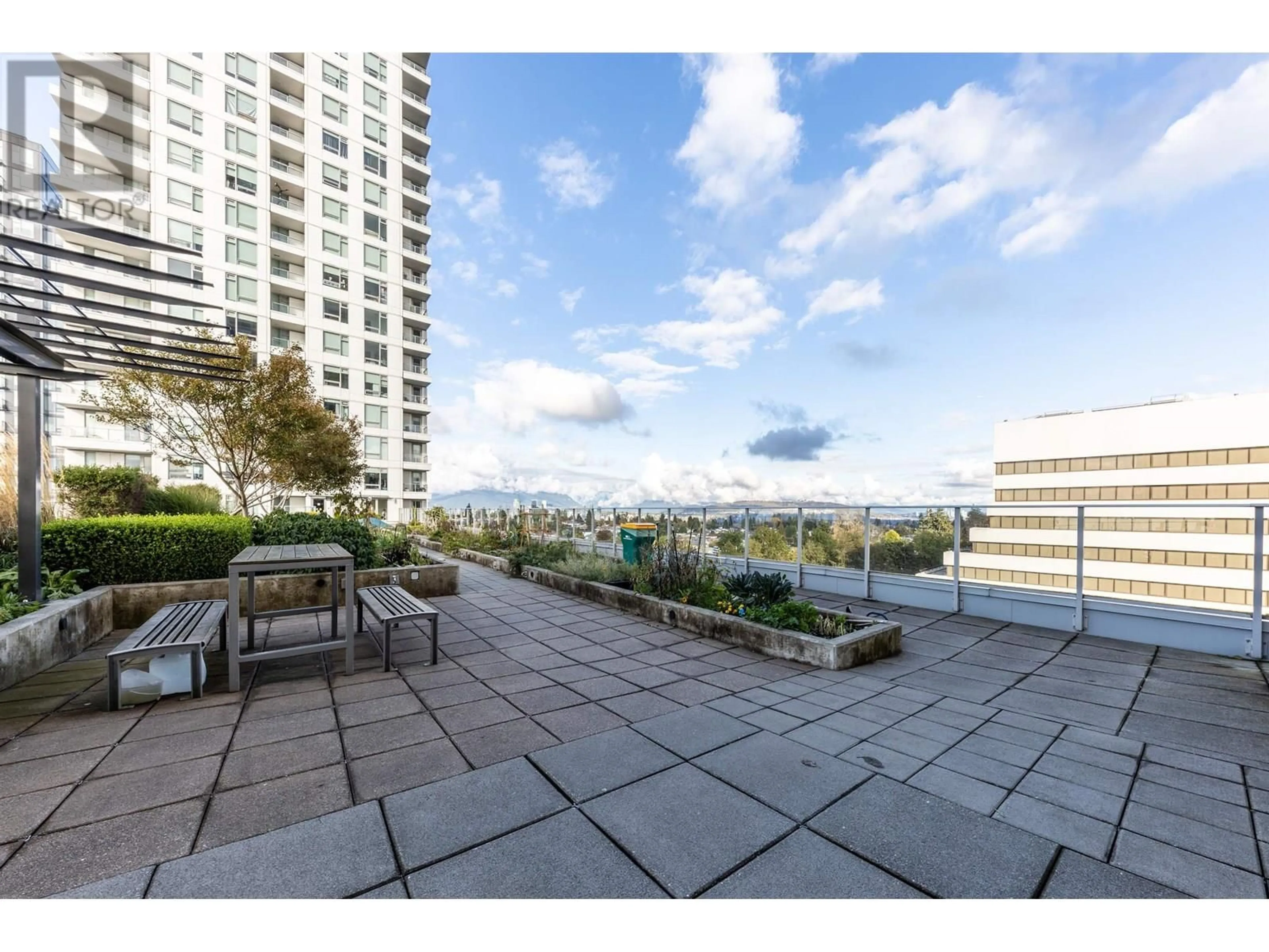 Patio, city buildings view from balcony for 2104 - 5665 BOUNDARY ROAD, Vancouver British Columbia V5R2P9