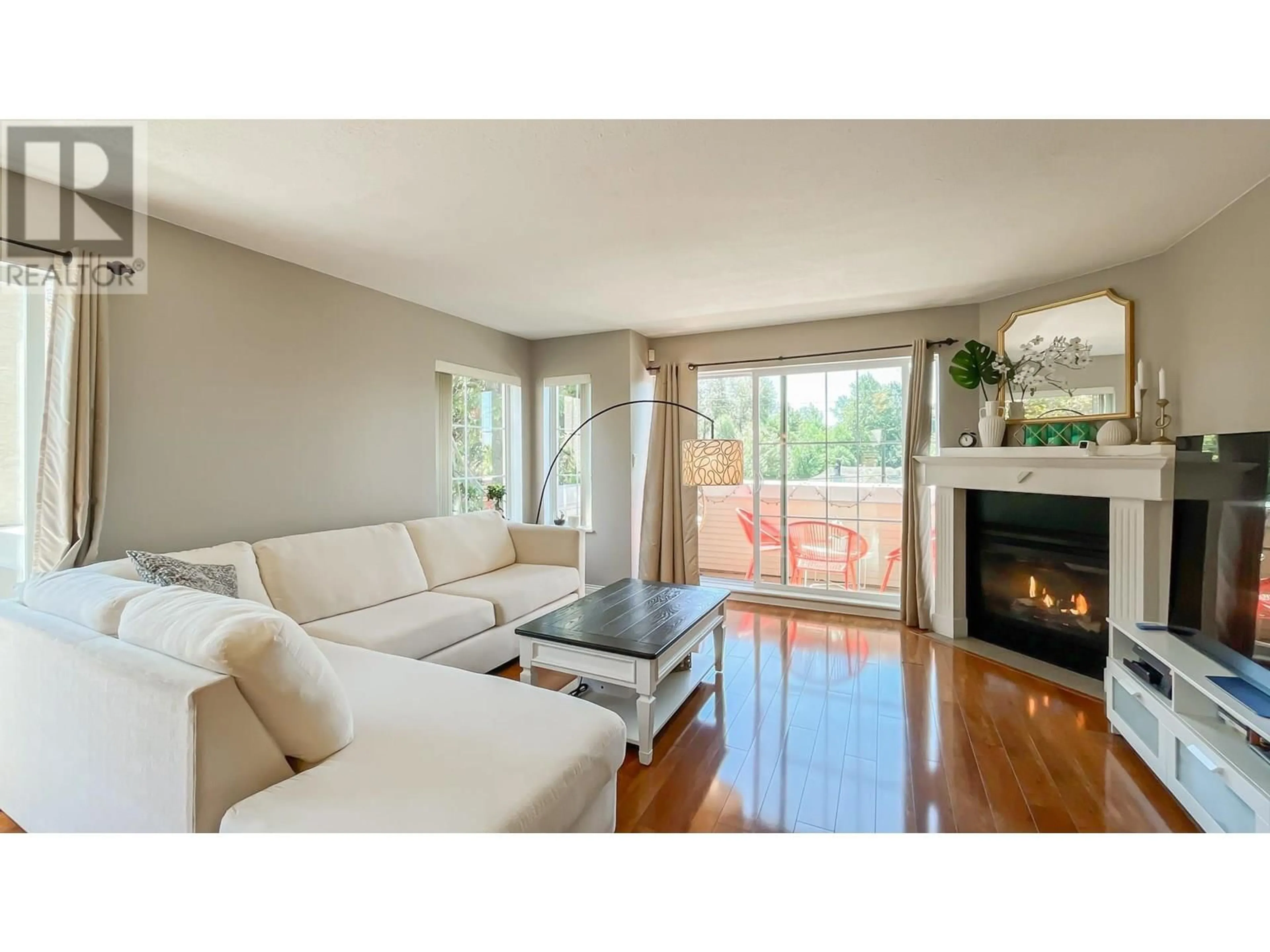 Living room with furniture, wood/laminate floor for 12 - 1383 BRUNETTE AVENUE, Coquitlam British Columbia V3K1G6