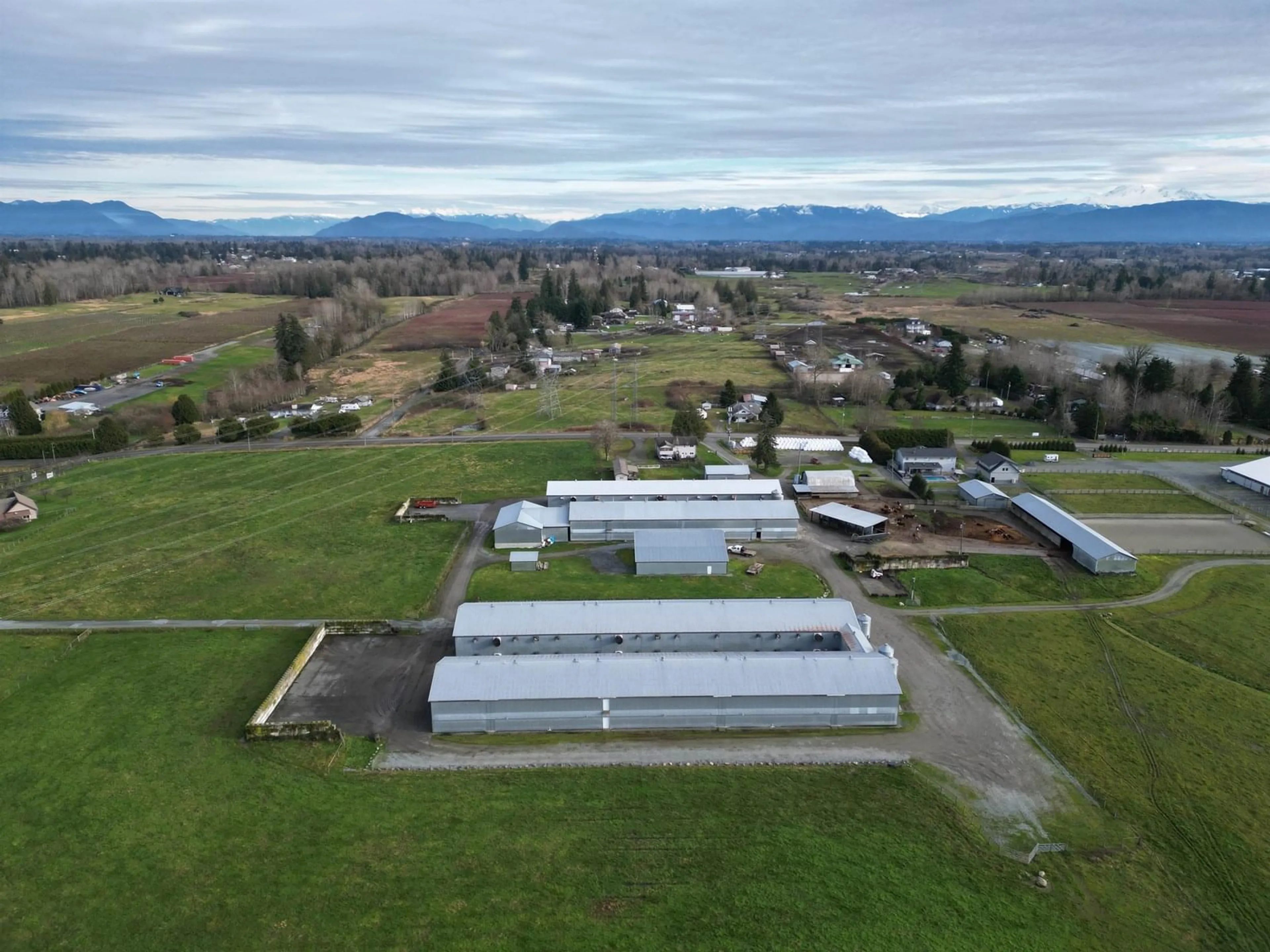 A pic from outside/outdoor area/front of a property/back of a property/a pic from drone, mountain view for 2535 240, Langley British Columbia V2Z3A6
