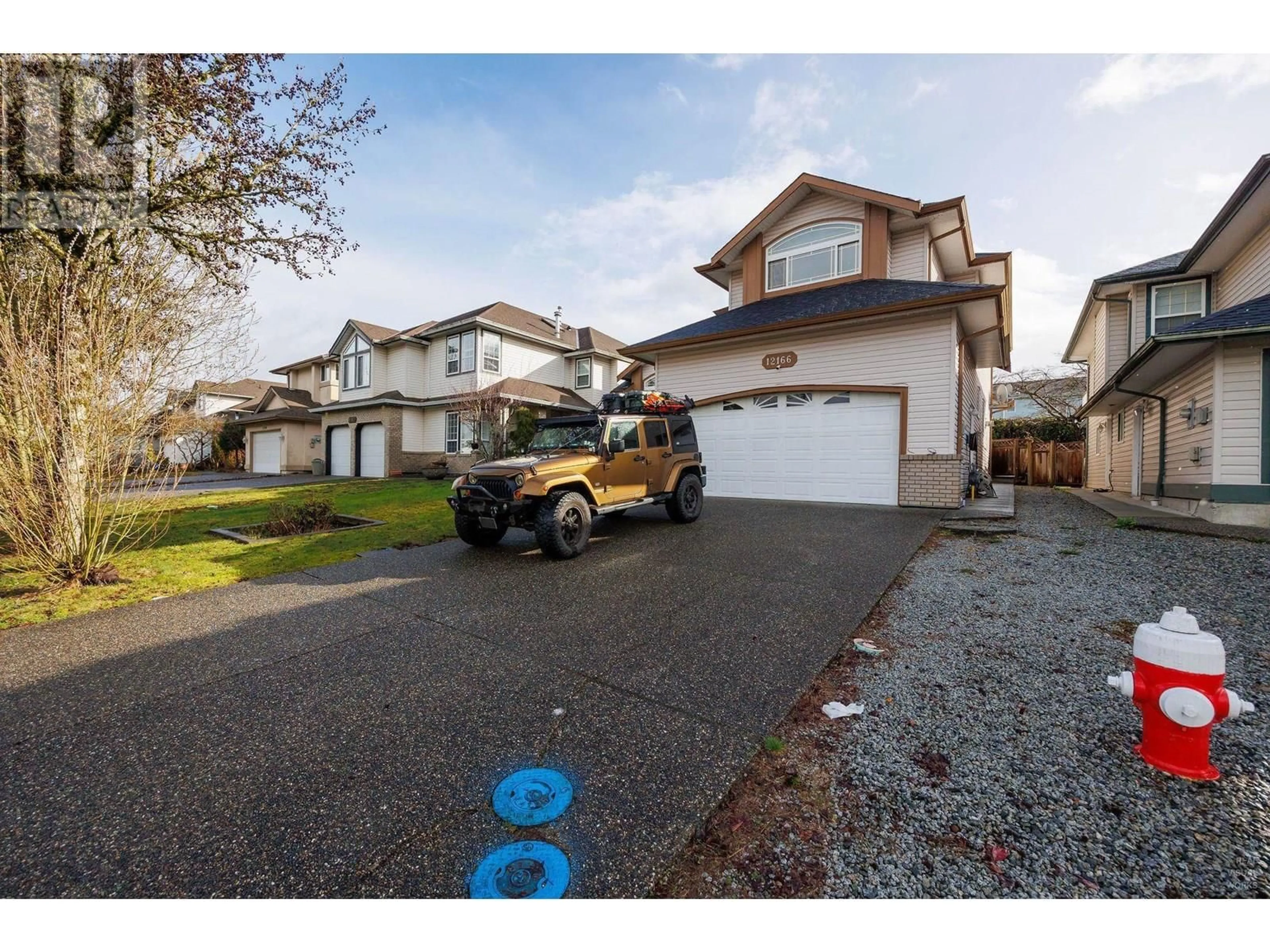 A pic from outside/outdoor area/front of a property/back of a property/a pic from drone, street for 12166 201B STREET, Maple Ridge British Columbia V2X3J8