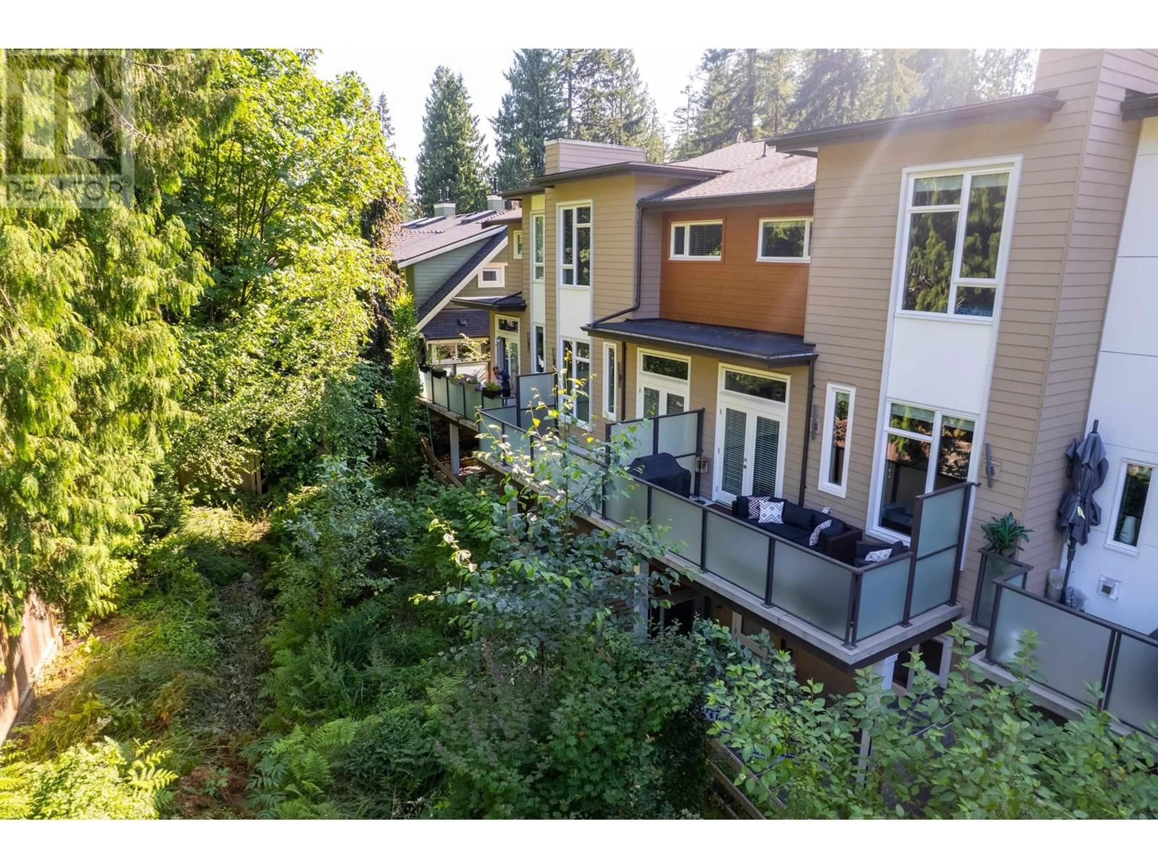 A pic from outside/outdoor area/front of a property/back of a property/a pic from drone, forest/trees view for 4676 CAPILANO ROAD, North Vancouver British Columbia V7R4K3