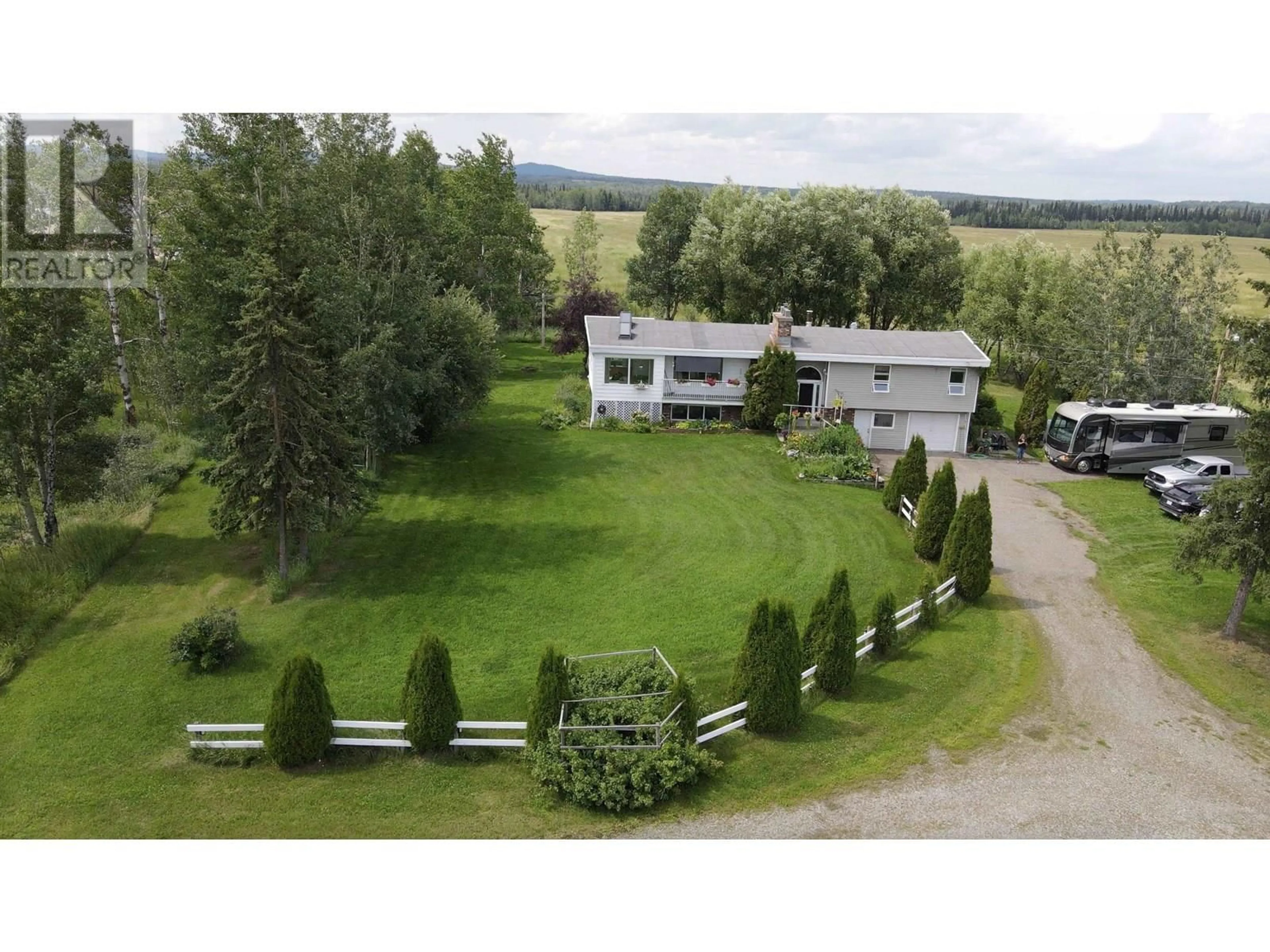 A pic from outside/outdoor area/front of a property/back of a property/a pic from drone, mountain view for 16795 HART HIGHWAY, Prince George British Columbia V2K5X5