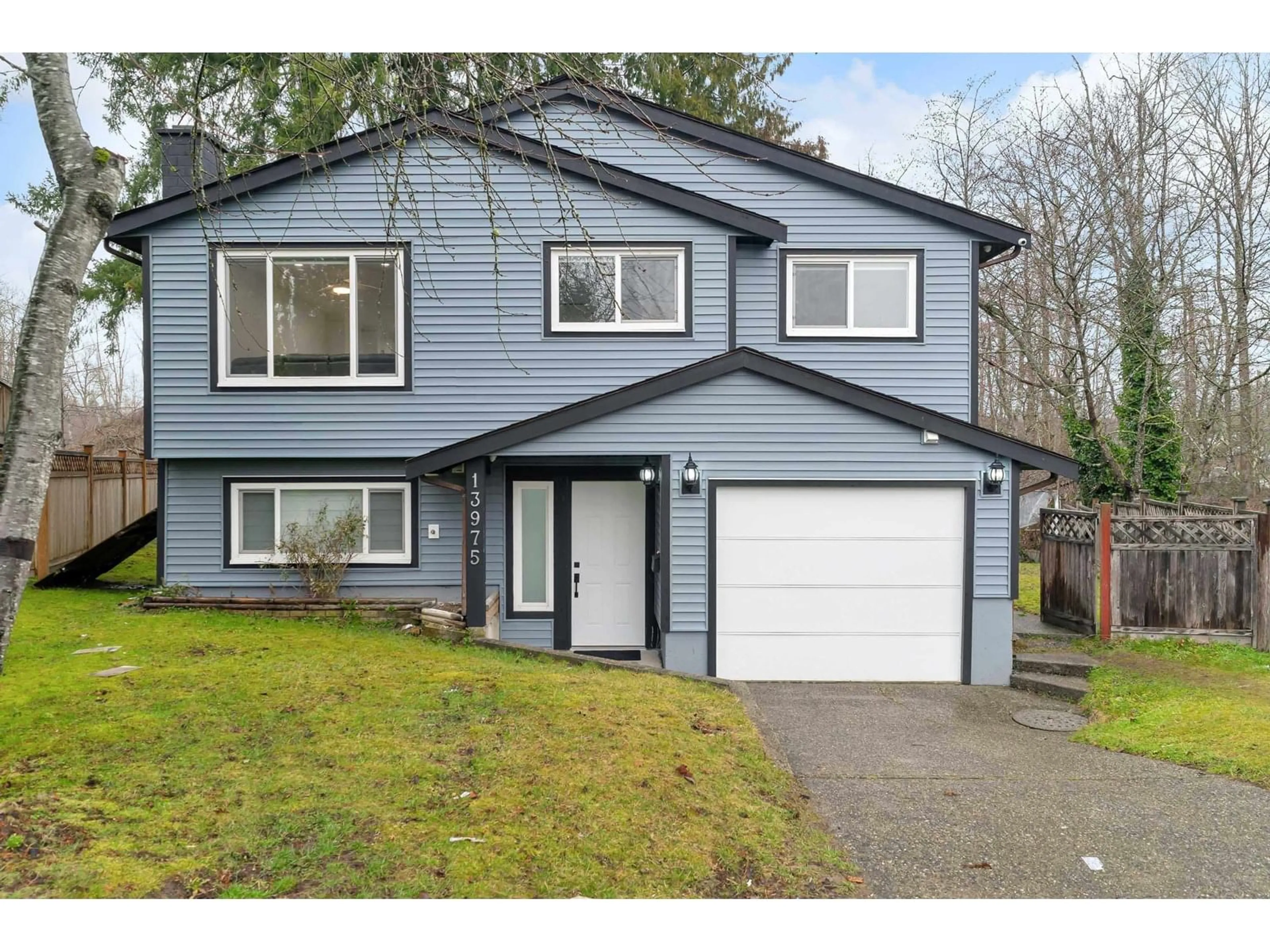Home with vinyl exterior material, street for 13975 80B, Surrey British Columbia V3W6P7