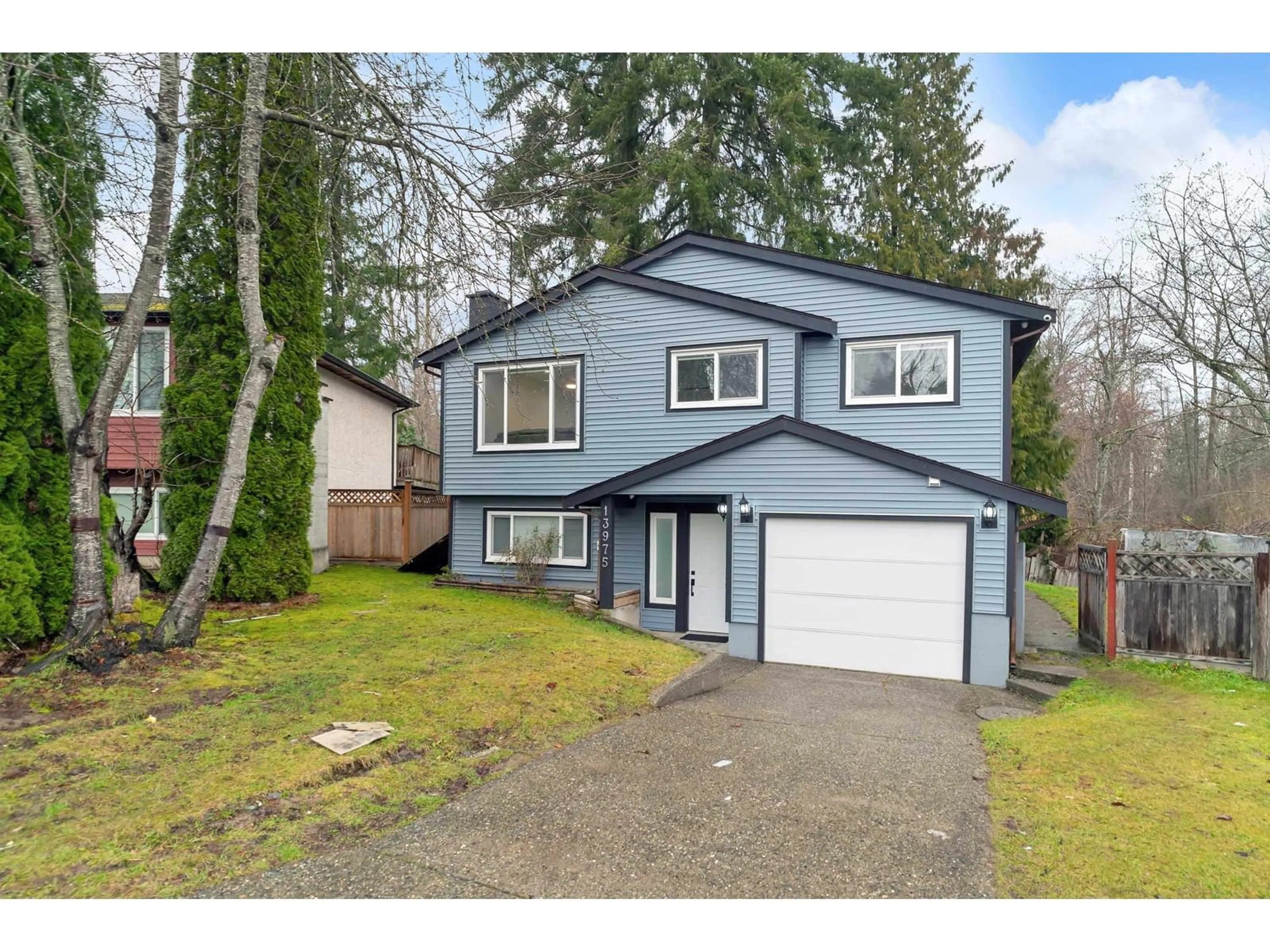 Home with vinyl exterior material, street for 13975 80B, Surrey British Columbia V3W6P7