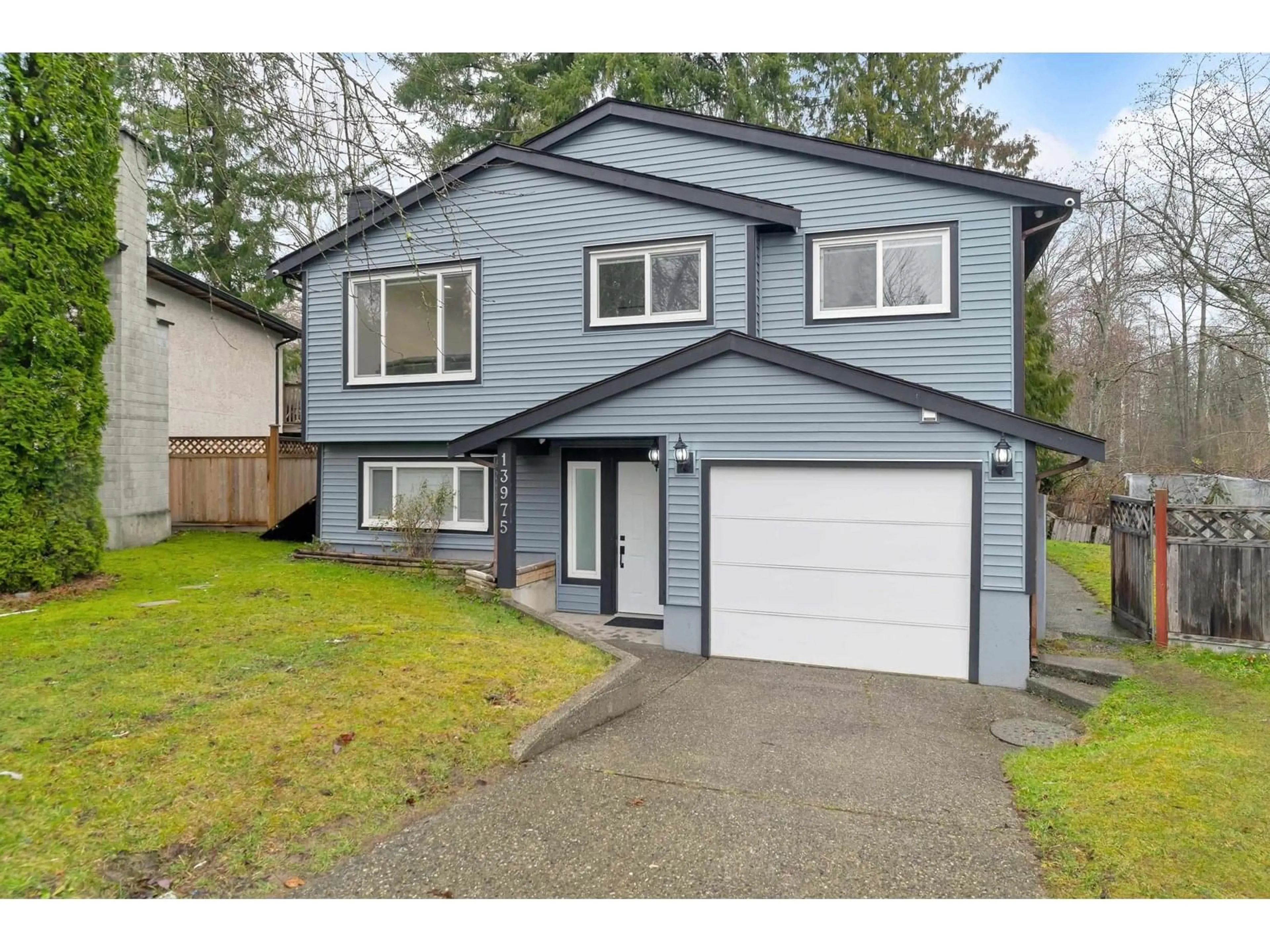 Home with vinyl exterior material, street for 13975 80B, Surrey British Columbia V3W6P7