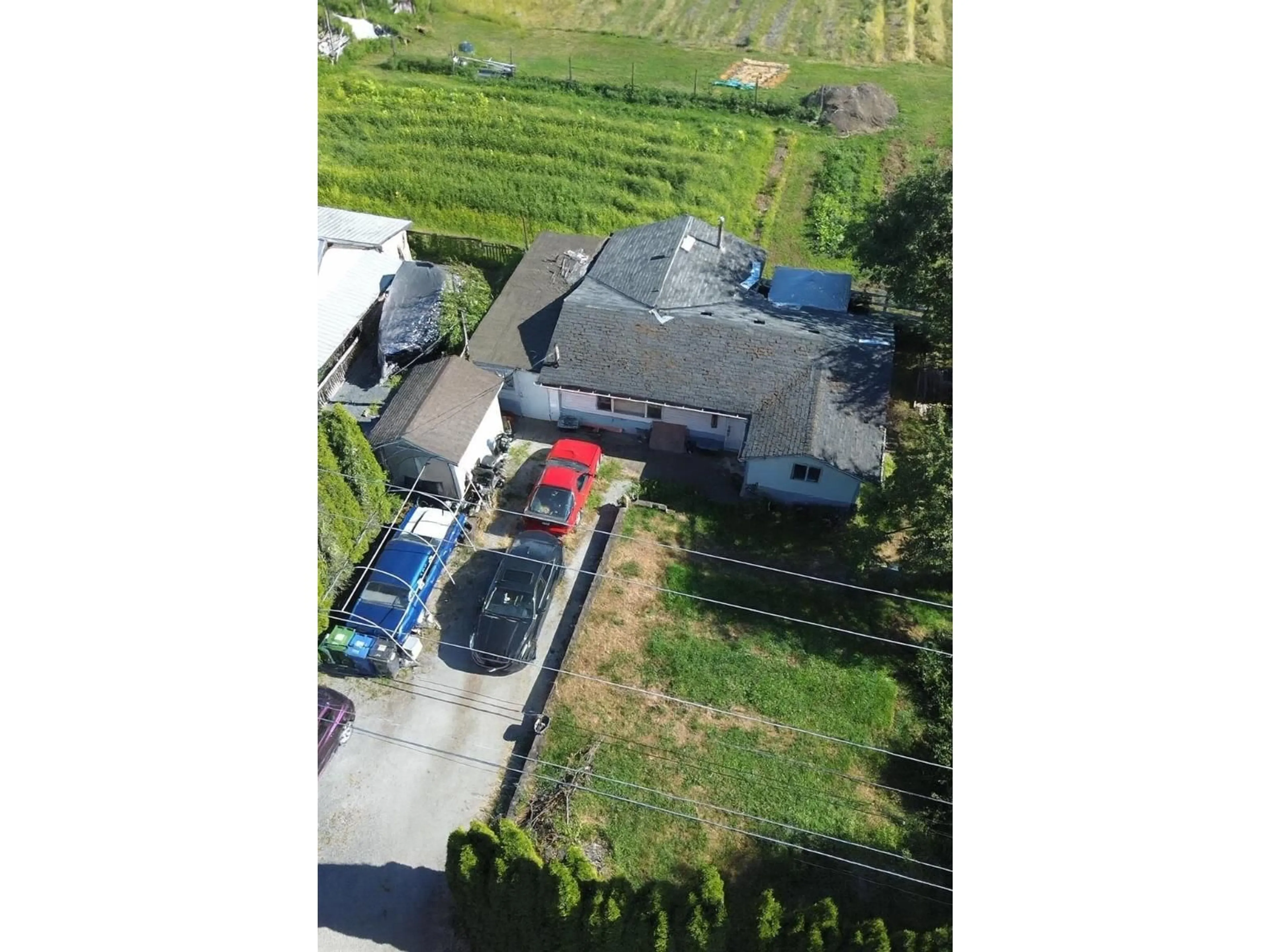 A pic from outside/outdoor area/front of a property/back of a property/a pic from drone, street for 34684 VYE ROAD, Abbotsford British Columbia V2S7P7