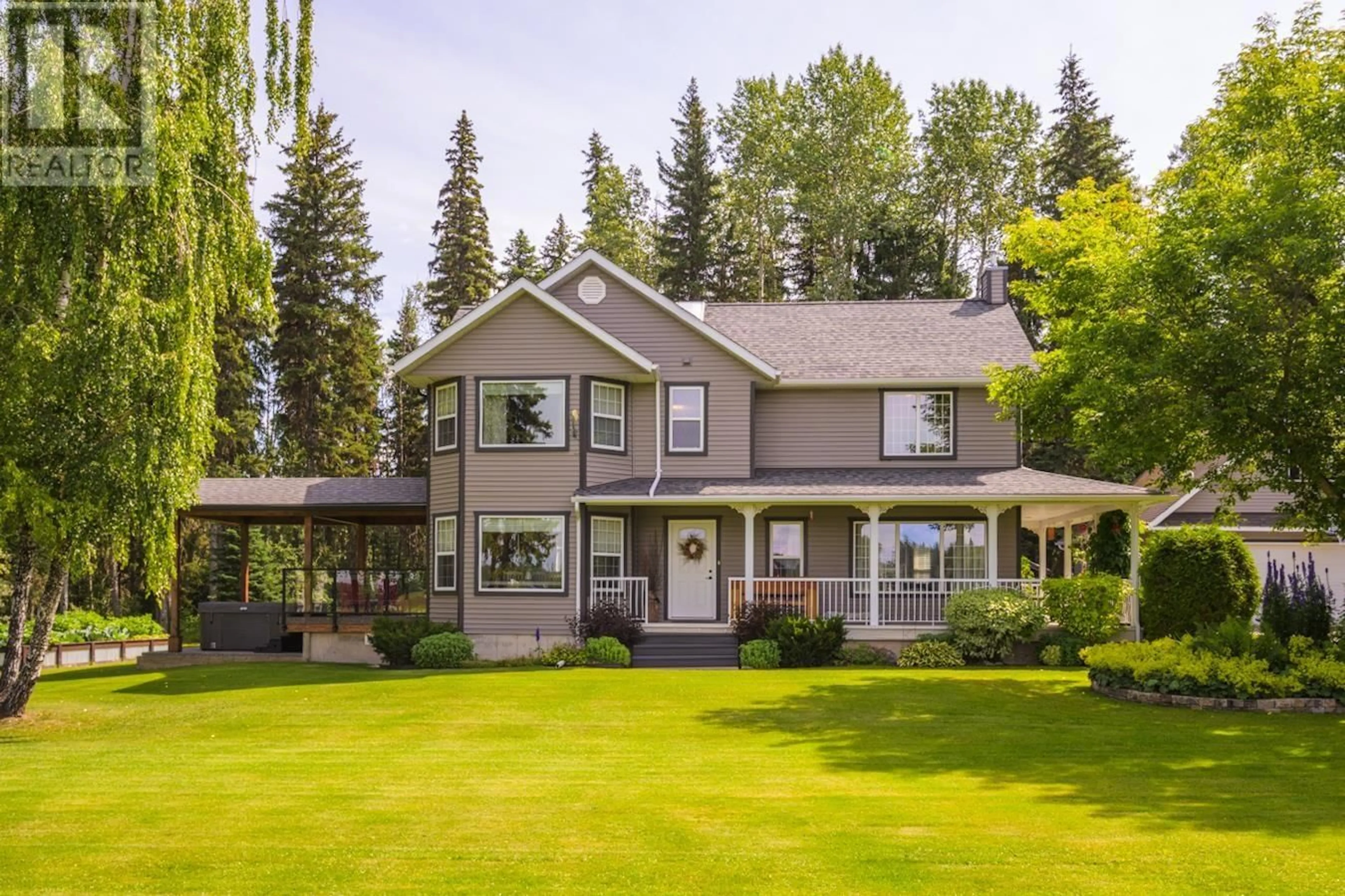 Home with vinyl exterior material, street for 11230 SIX MILE LAKE ROAD, Prince George British Columbia V2N6V4