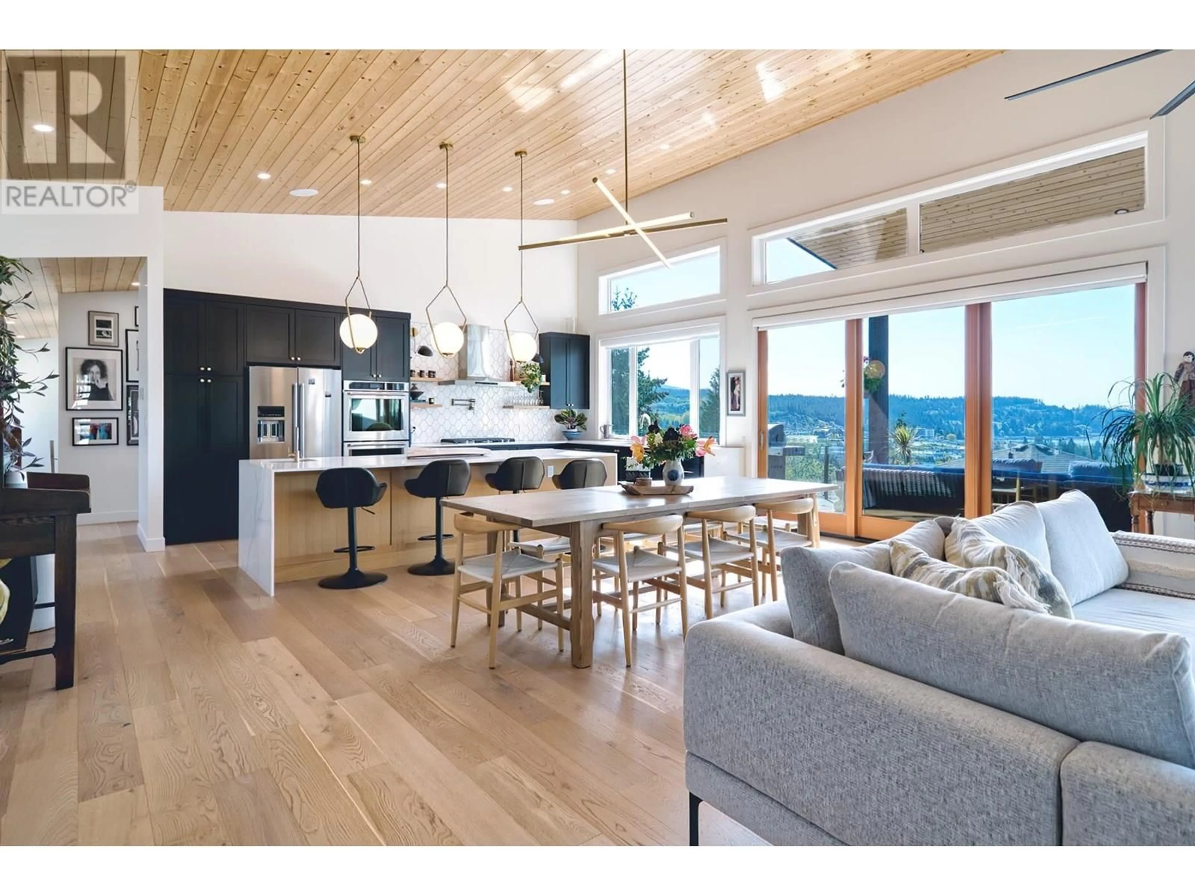 Open concept kitchen, wood/laminate floor for 5769 GENNI'S WAY, Sechelt British Columbia V7Z0N8
