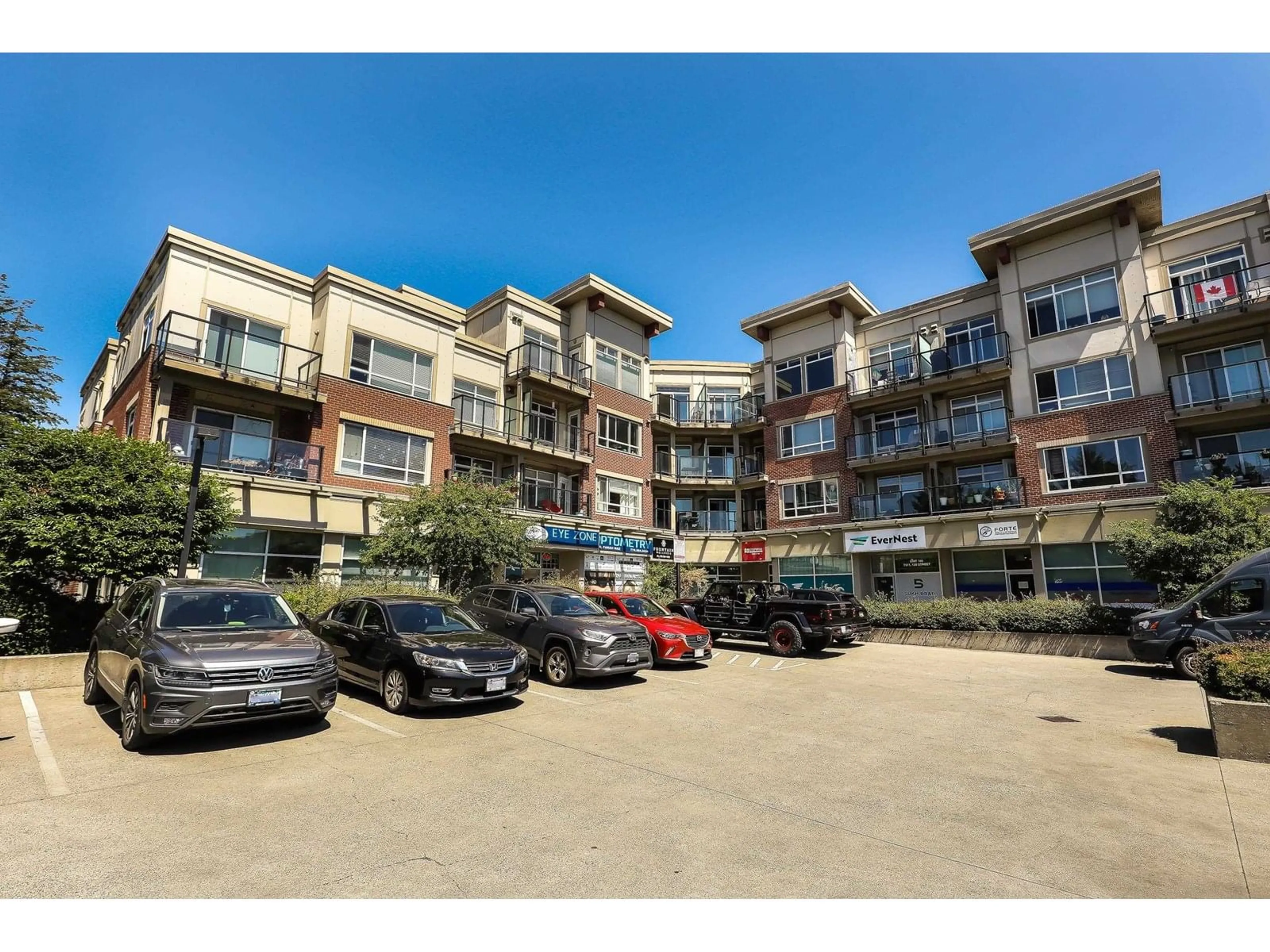A pic from outside/outdoor area/front of a property/back of a property/a pic from drone, street for 211 - 7511 120, Delta British Columbia V4C0C1