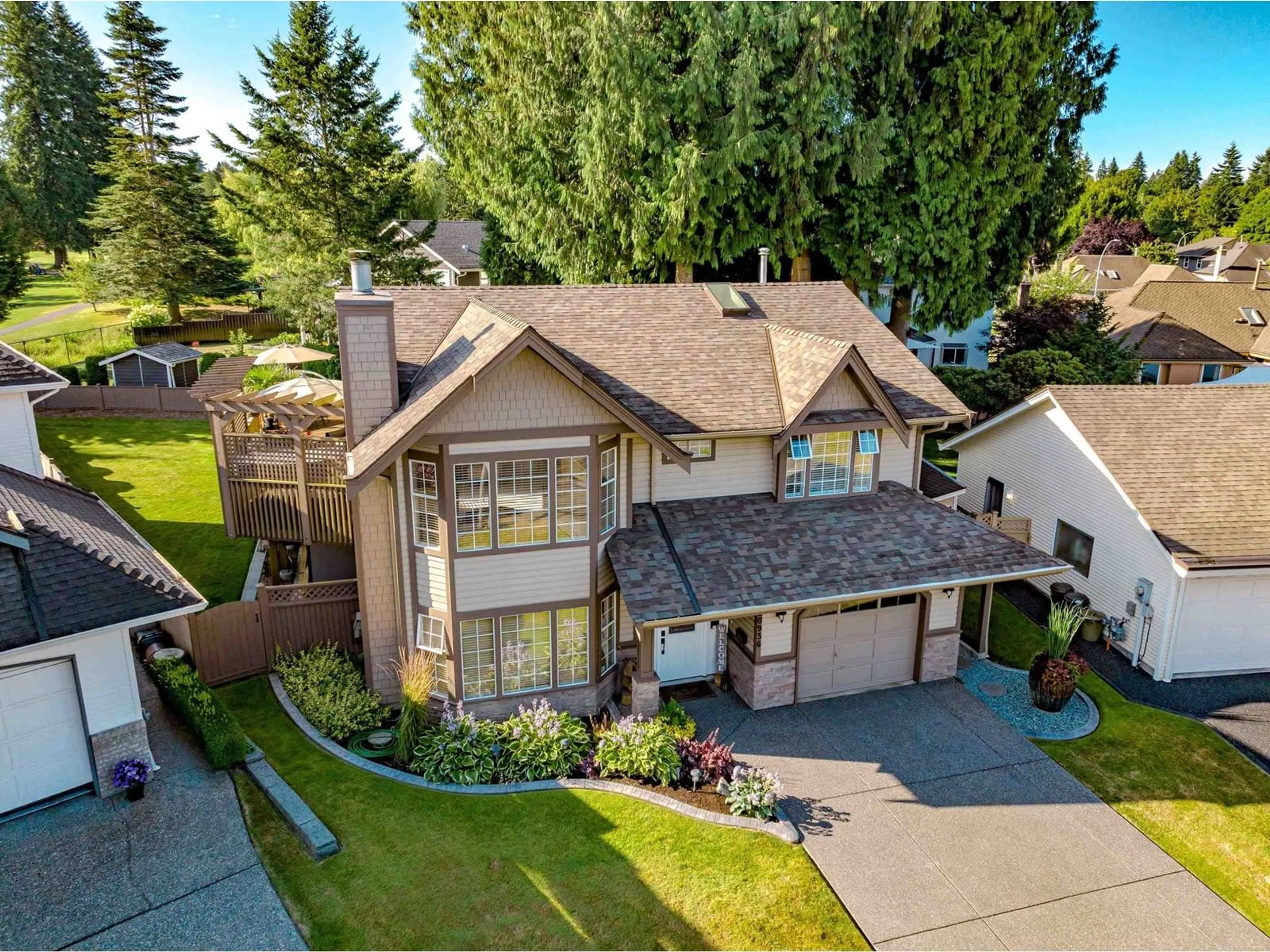 A pic from outside/outdoor area/front of a property/back of a property/a pic from drone, street for 20936 49A, Langley British Columbia V3A5Y6