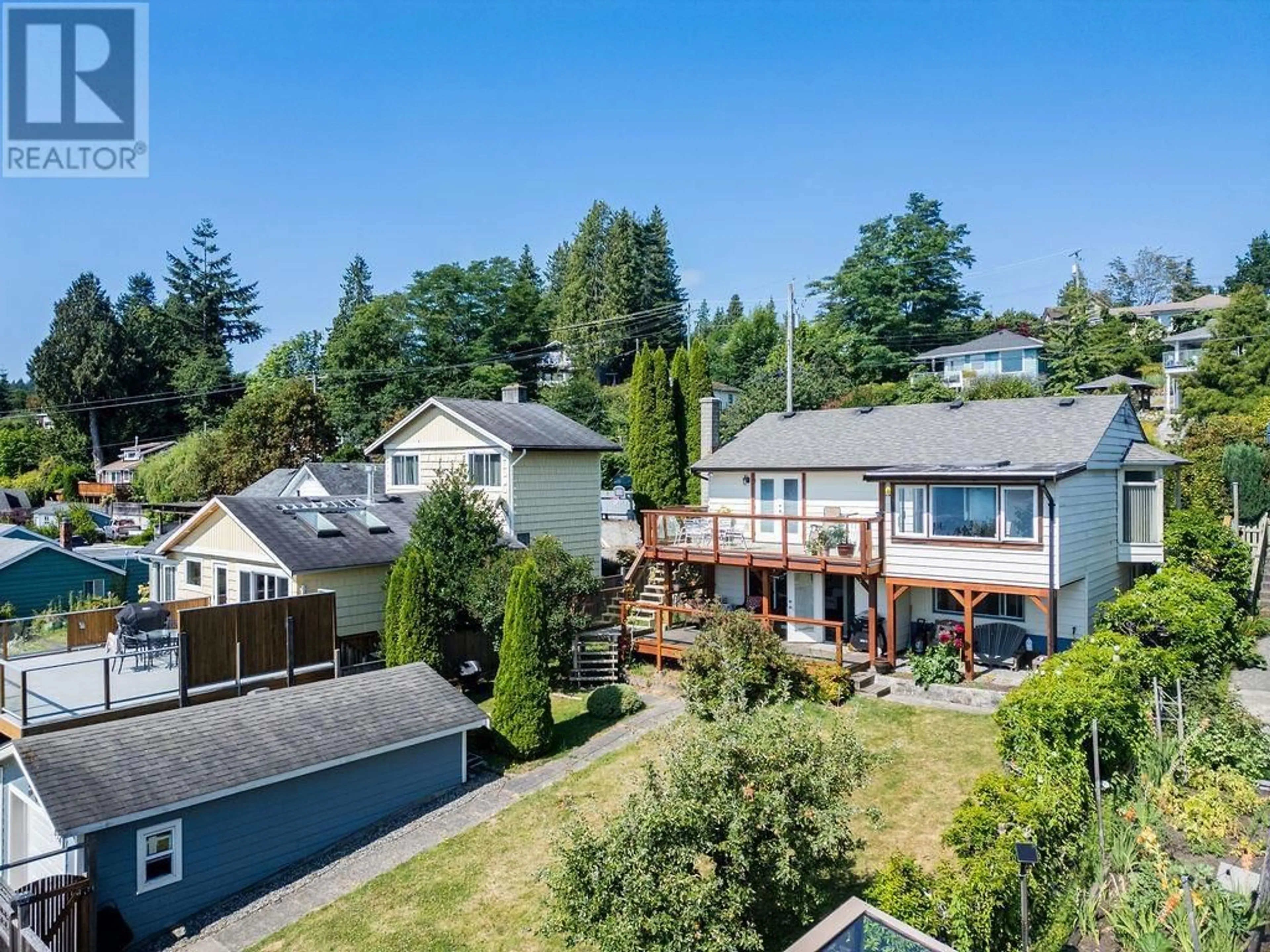 A pic from outside/outdoor area/front of a property/back of a property/a pic from drone, mountain view for 614 GLEN ROAD, Gibsons British Columbia V0N1V9