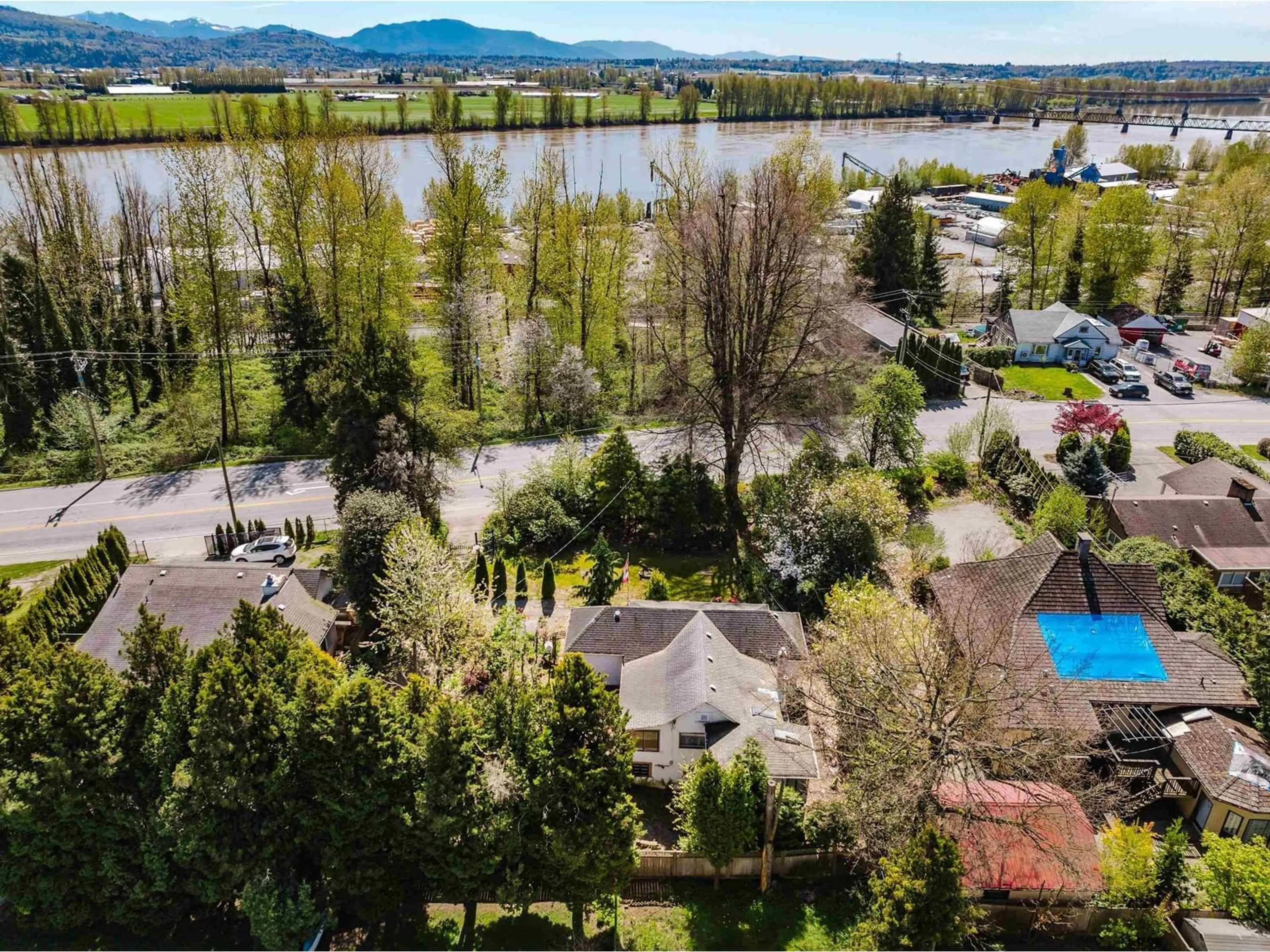 A pic from outside/outdoor area/front of a property/back of a property/a pic from drone, water/lake/river/ocean view for 33601 1ST, Mission British Columbia V2V1H3