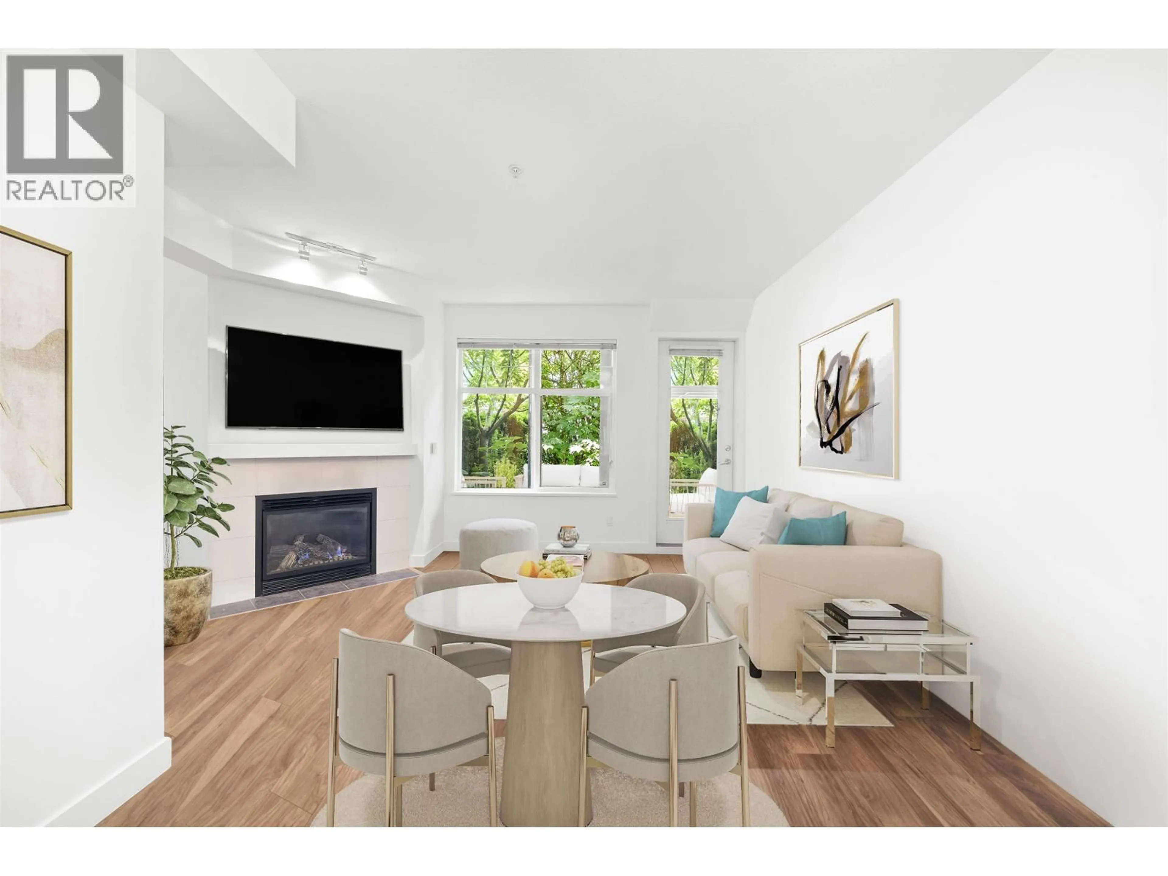 Living room with furniture, wood/laminate floor for 106 - 3240 ST JOHNS STREET, Port Moody British Columbia V3H0C1