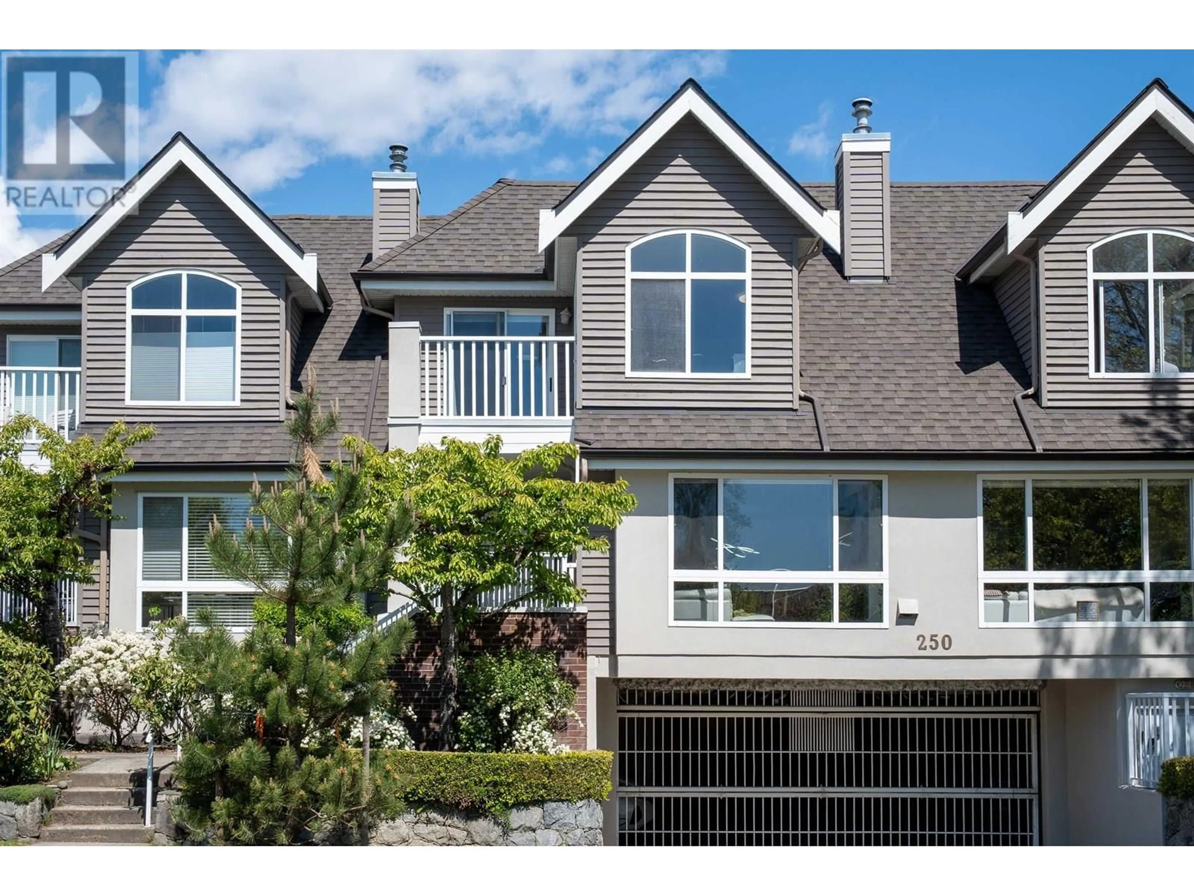 Home with vinyl exterior material, street for 2 - 250 KEITH ROAD, North Vancouver British Columbia V7L1V5