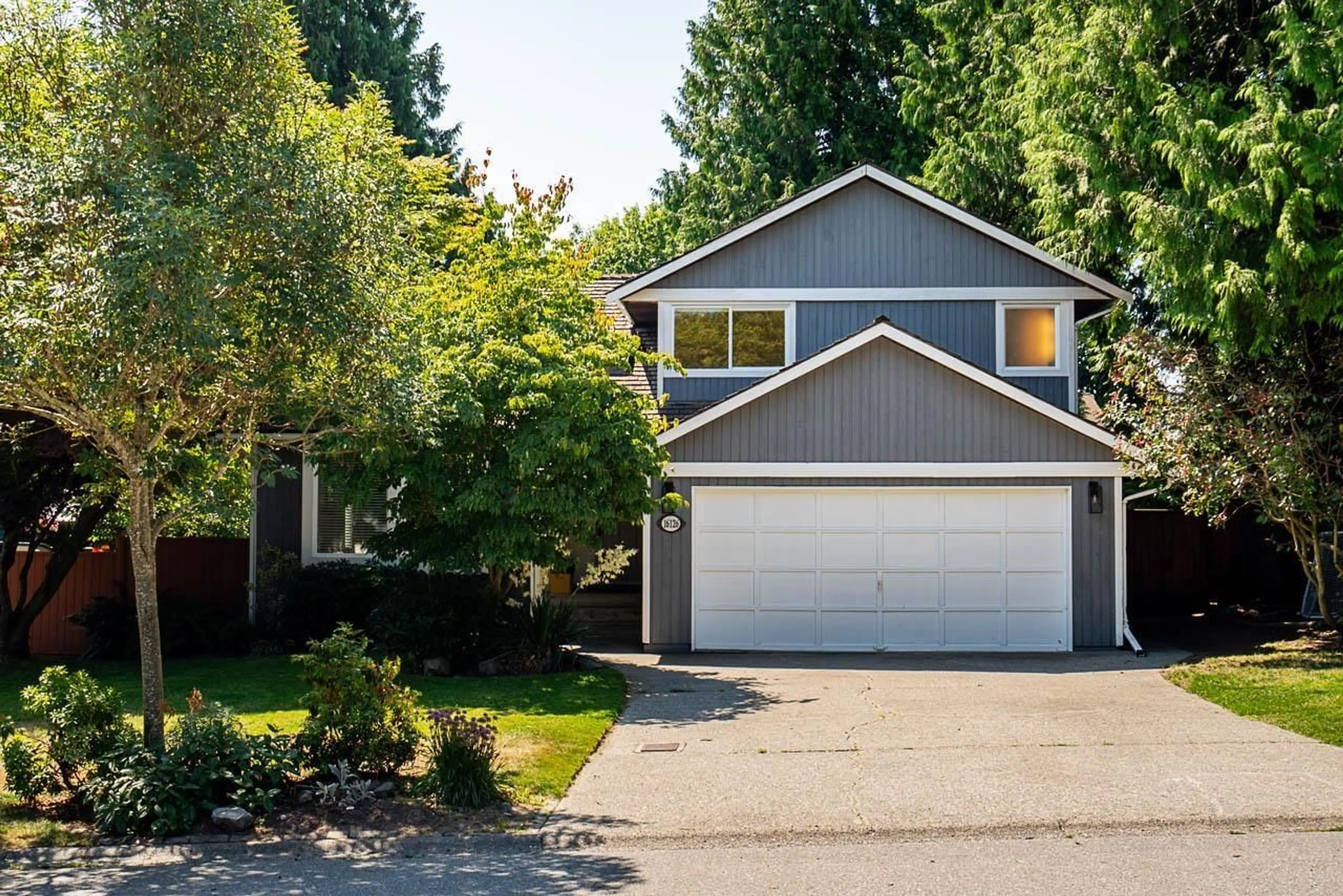 Home with vinyl exterior material, street for 16126 12A, Surrey British Columbia V4A6V9