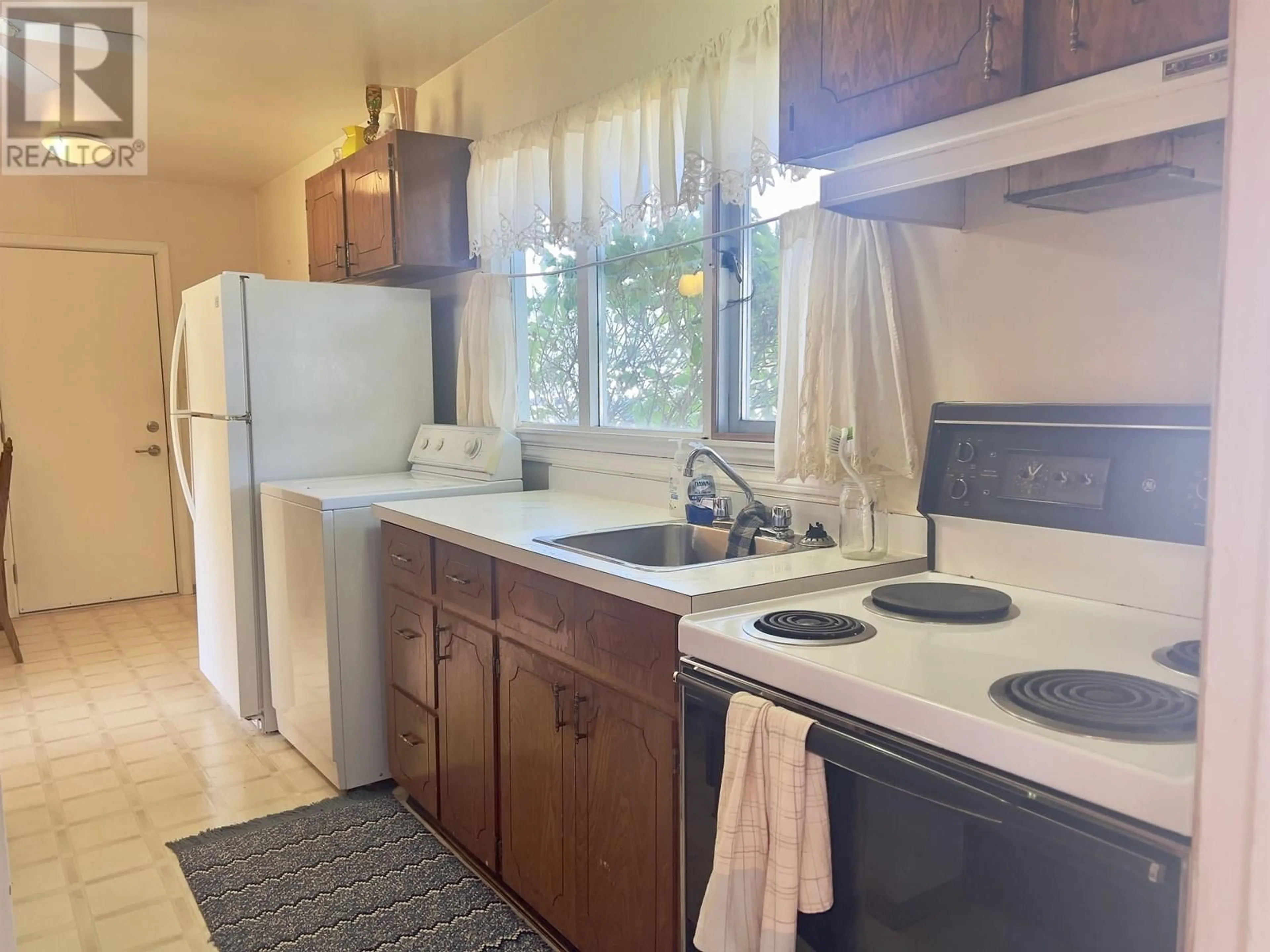 Standard kitchen, ceramic/tile floor for 28 KECHIKA STREET, Kitimat British Columbia V8C1Y8