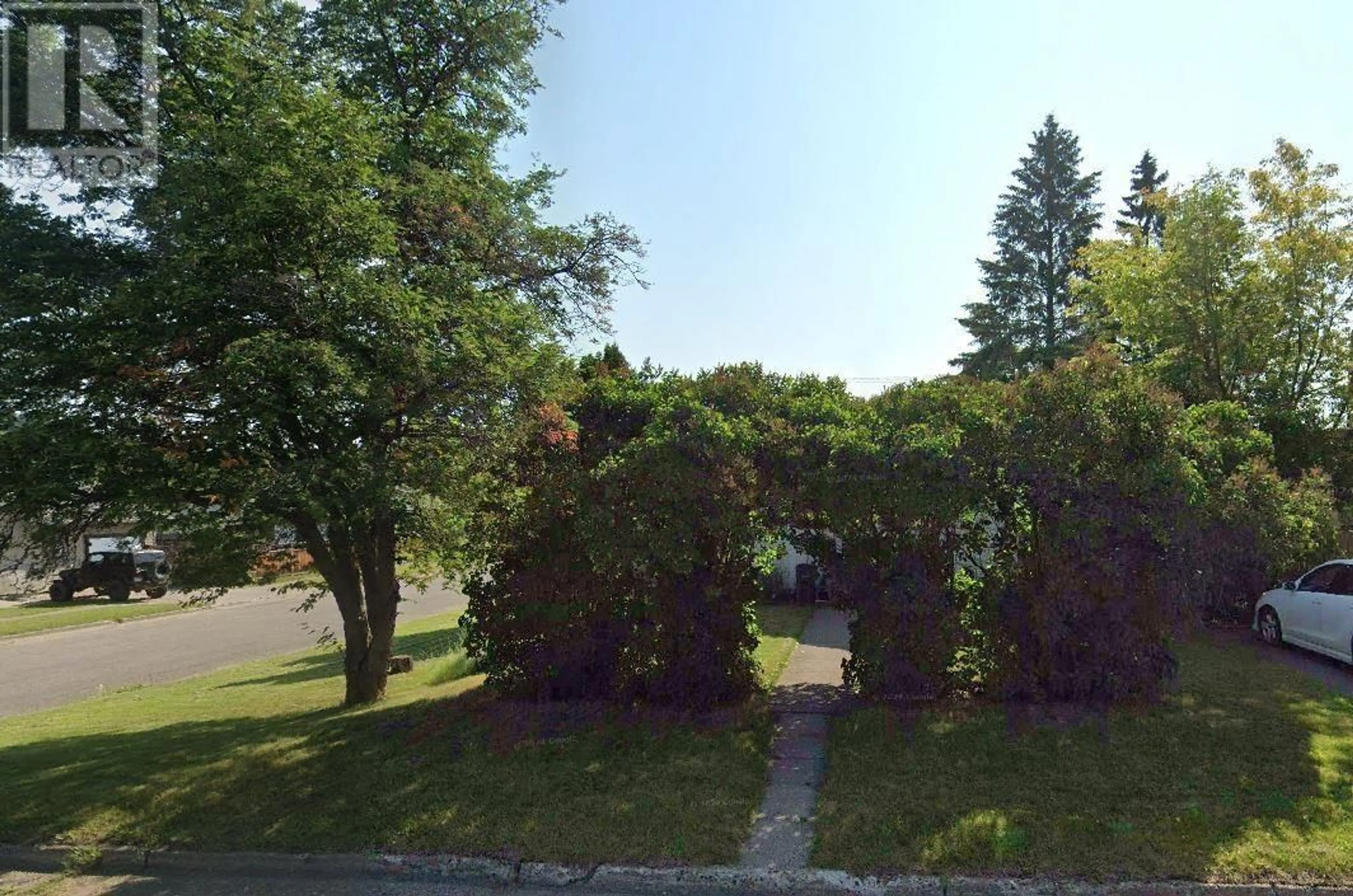 A pic from outside/outdoor area/front of a property/back of a property/a pic from drone, forest/trees view for 408 WATROUS STREET, Prince George British Columbia V2M2B7