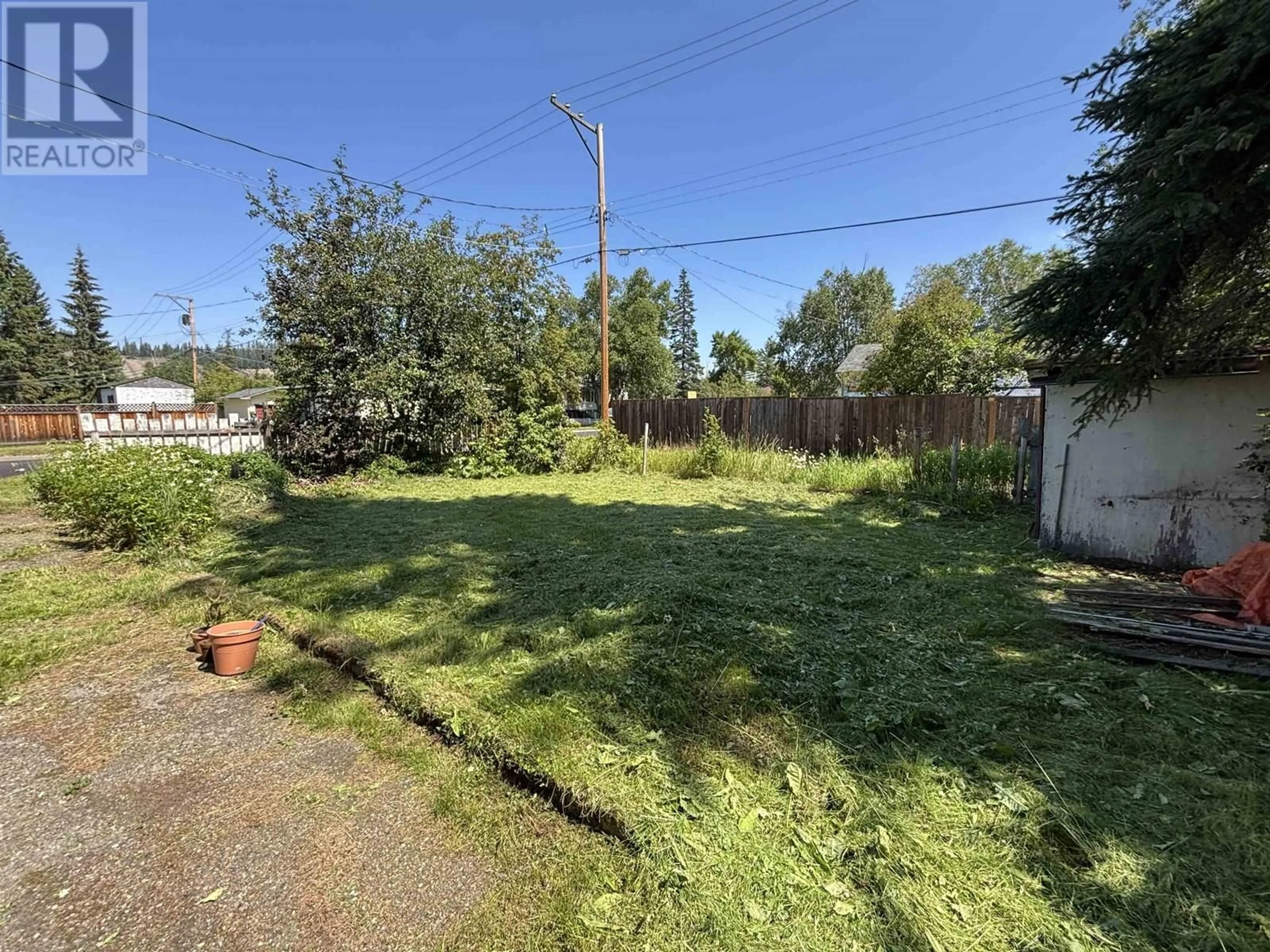 A pic from outside/outdoor area/front of a property/back of a property/a pic from drone, street for 408 WATROUS STREET, Prince George British Columbia V2M2B7