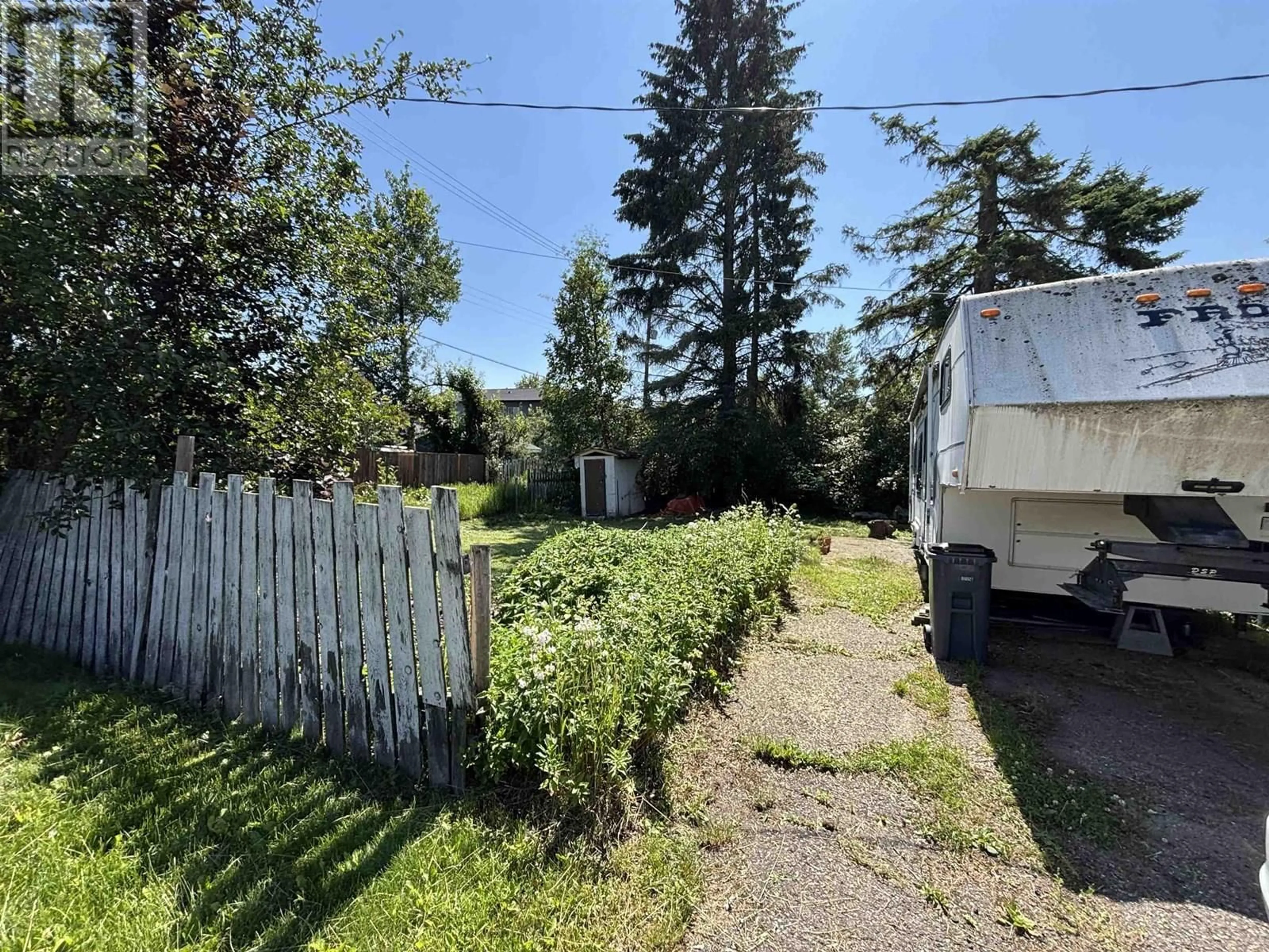 A pic from outside/outdoor area/front of a property/back of a property/a pic from drone, street for 408 WATROUS STREET, Prince George British Columbia V2M2B7