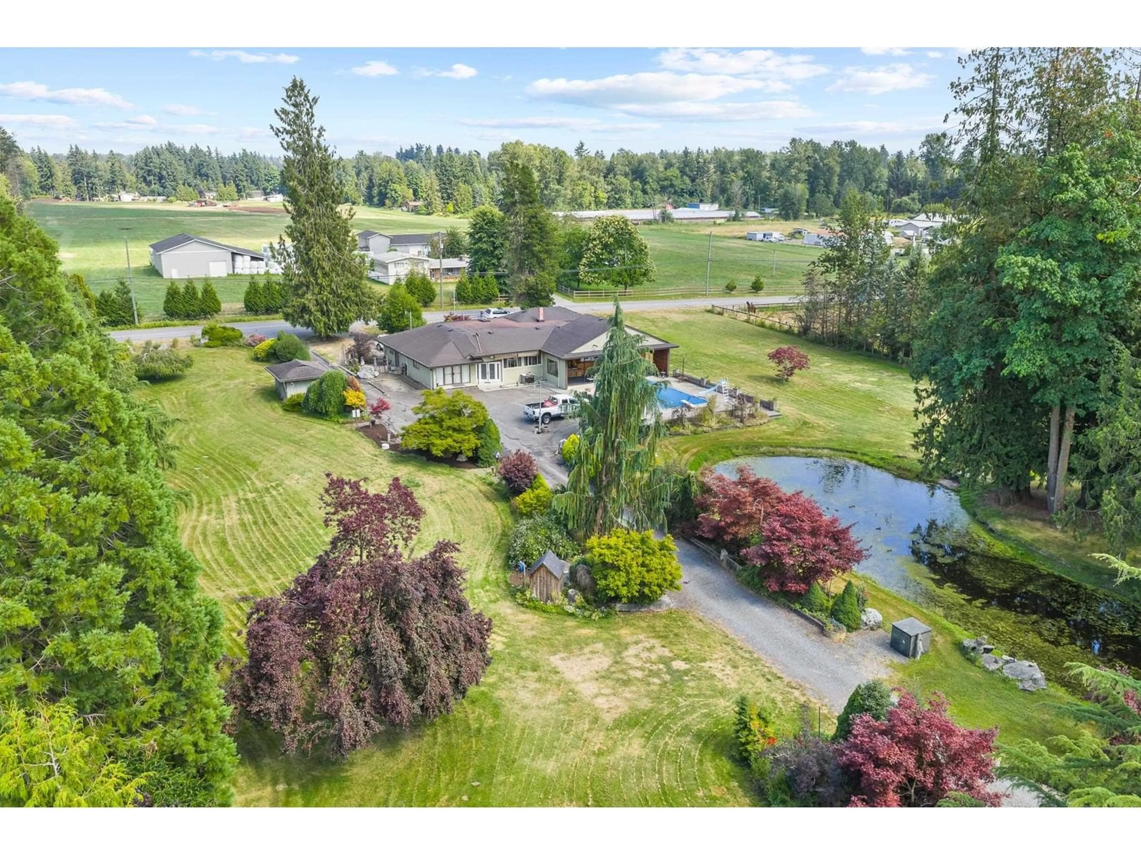 A pic from outside/outdoor area/front of a property/back of a property/a pic from drone, water/lake/river/ocean view for 1173 248, Langley British Columbia V4W2B8