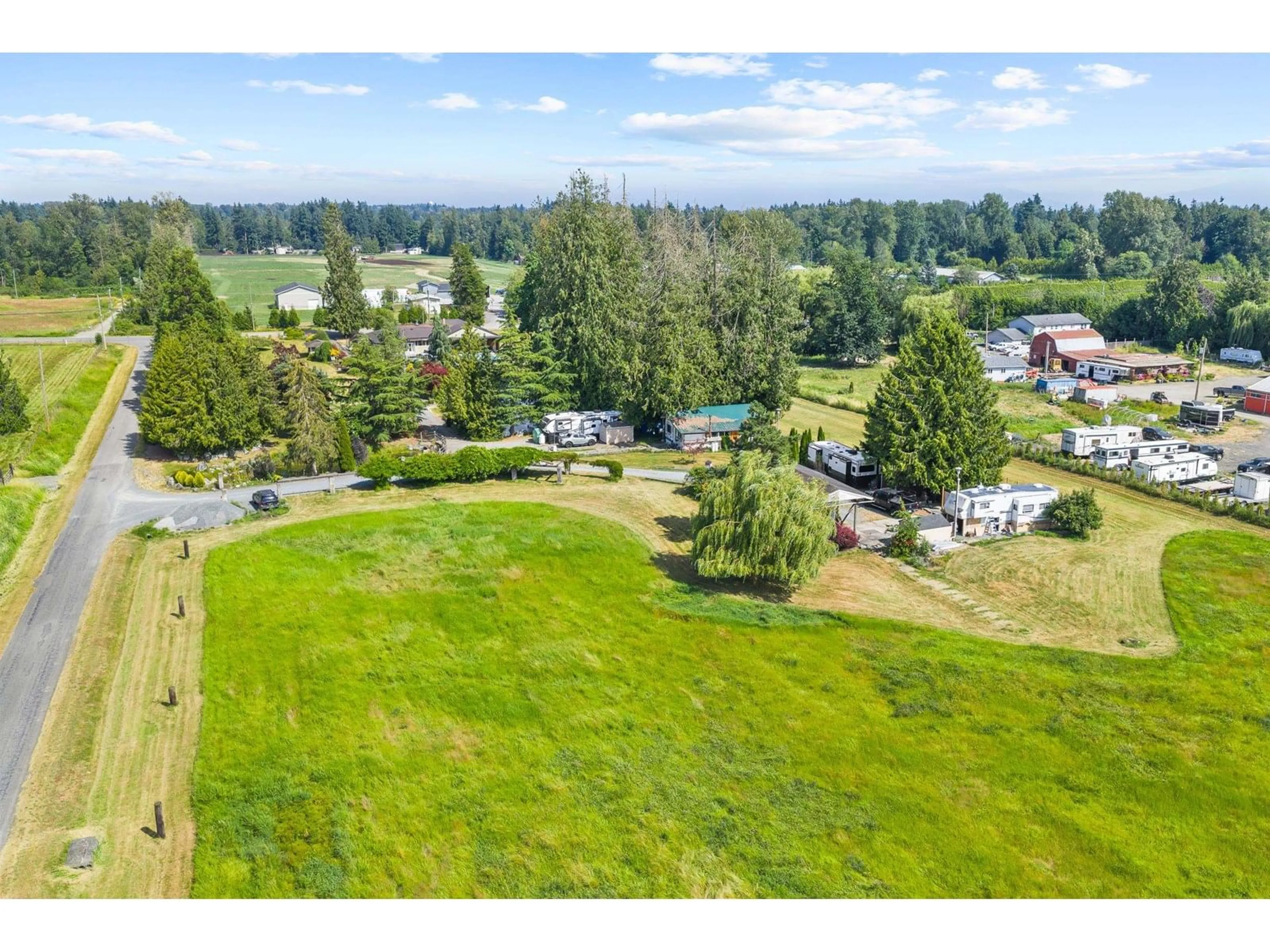 A pic from outside/outdoor area/front of a property/back of a property/a pic from drone, water/lake/river/ocean view for 1173 248, Langley British Columbia V4W2B8